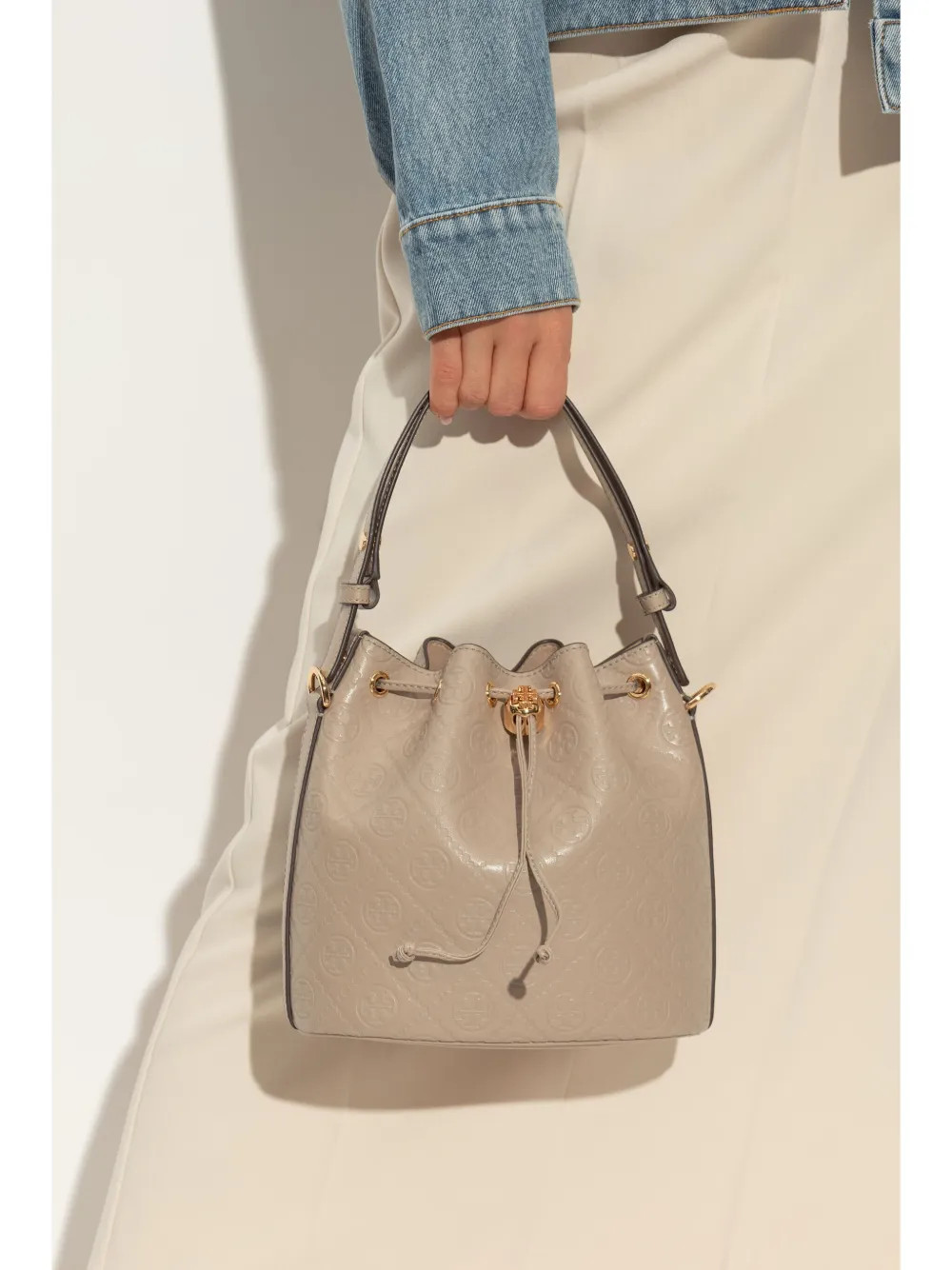 Tory Burch All-over-debossed Logo Bucket Bag  | Neutrals | FARFETCH | Farfetch Global