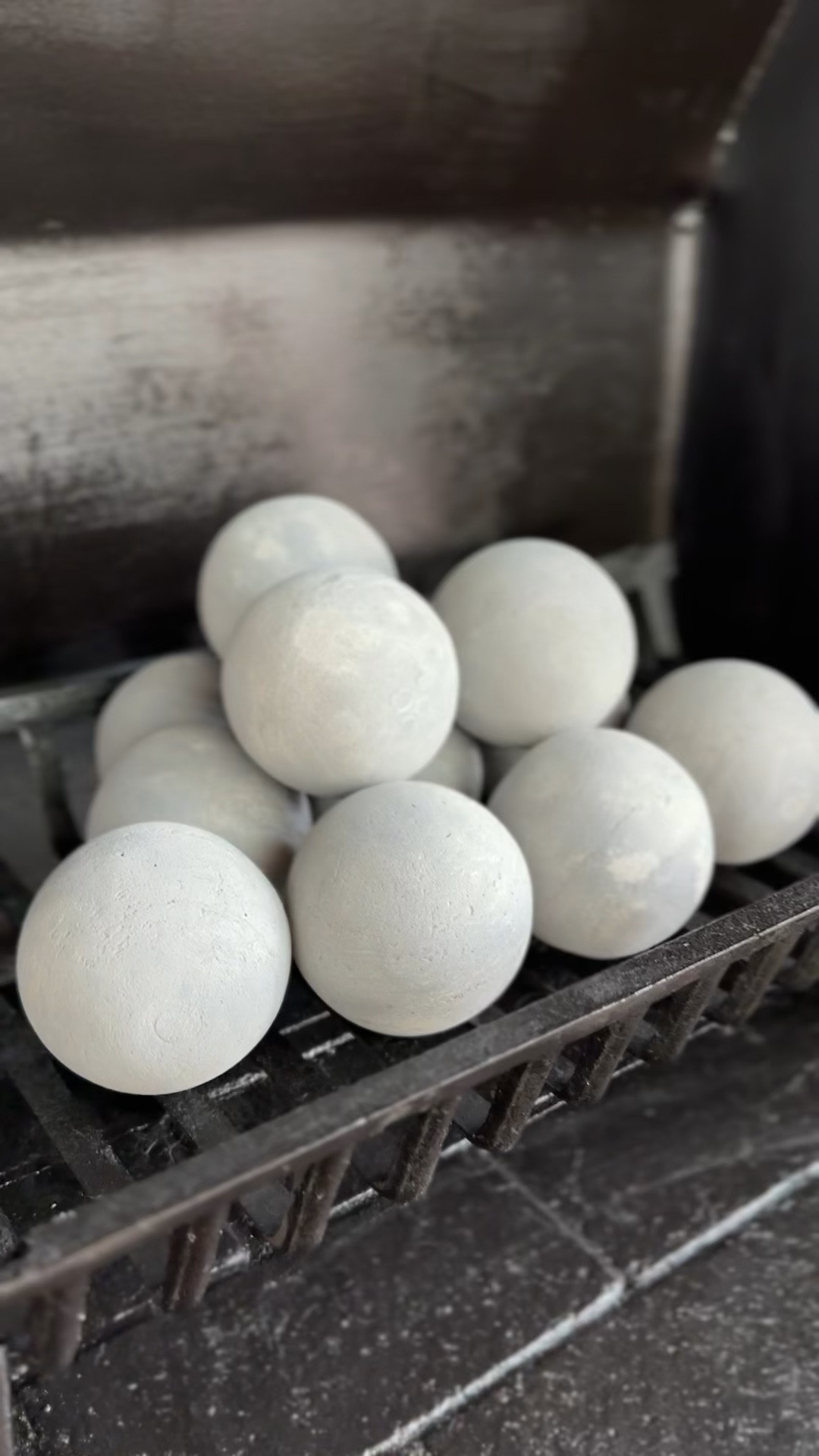 Fire place modern cement balls 

#LTKSeasonal #LTKHome #LTKSaleAlert
