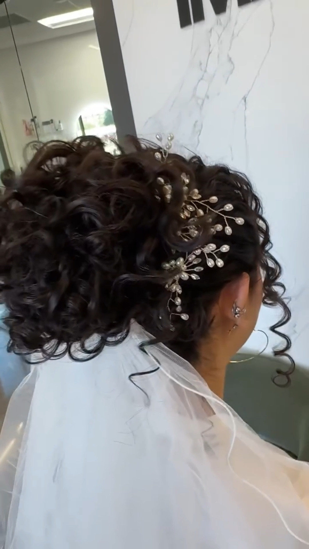 CURLY BRIDAL UPDO 👰🏻‍♀️

There are lots of stylists out there that will happily iron curl your natural curly hair to get the most “tamed” result for your wedding day. 

Me? I do things differently. 😌 

I cleanse, condition and style your curls to utter perfection for the big day. So you can feel like the best version of yourself with the absolute best hair day! 

Wanting a stylist that embraces your natural curls for your big day? 

Let’s talk babe! 👰🏻‍♀️

📌 the curly in this video has the healthiest curls thanks to @ashlovesyourhair and their collaboration in the salon. Healthy hair truly is the easiest to work with y’all! @victoria_345

#LTKBeauty #LTKValentine #LTKWedding