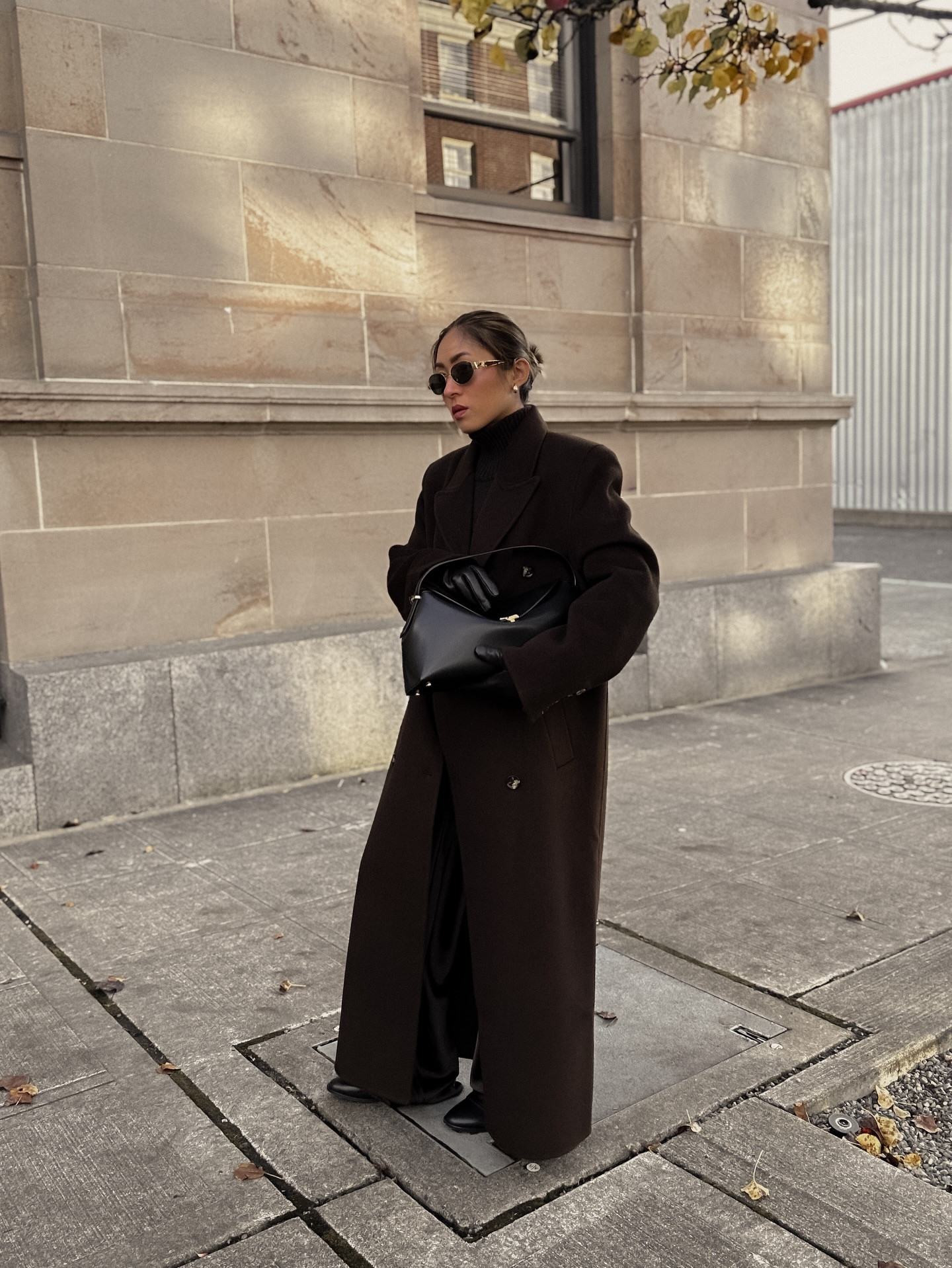 These 3 closet essentials changed the BALLGAME of my minimalist winter wardrobe 🍂🤍🤭

1. A high quality wool/cashmere coat - it’s not just for looks! High quality wools are not only insulating, they  help regulate moisture and maintains durability so I can stand out here in rainy Seattle for hours taking pictures and not feel the need to run back inside! 
2. Satin trousers - I have them in black, brown, and white. As a girl who does NOT enjoy reaching for denim, these trousers are a staple I pull off the rack over and over again for minimalist luxury in comfort 
3. A timeless, minimalistic black leather bag - I used to love bags that make a statement, but the big problem? Never reached for them! So I traded those loud pieces for simplicity—A chic black leather tote with quiet gold accents and no labeling whatsoever. Look at my recent feed, have I put this bag down yet? ;)

Outfit details: 👇🏻
🤍 sweater: @cosstores 
🤍 trousers: @cosstores 
🤍 bag: @toteme 
🤍 coat: @almadalabel 
🤍 boots: @loiret_seoul 

🔗 Outfit specifics always linked in bio → LTK @amandacapsulewardrobe
⸻

#scandiminimalism #elegantoutfit #timelessoutfit #quietluxurystyle #capsulecloset