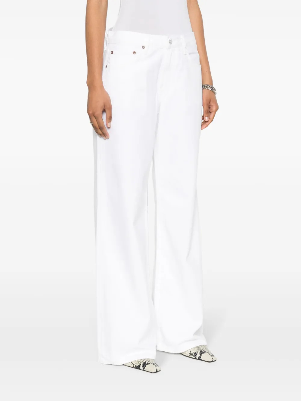 AGOLDE Clara low-rise Flared Jeans - Farfetch | Farfetch Global