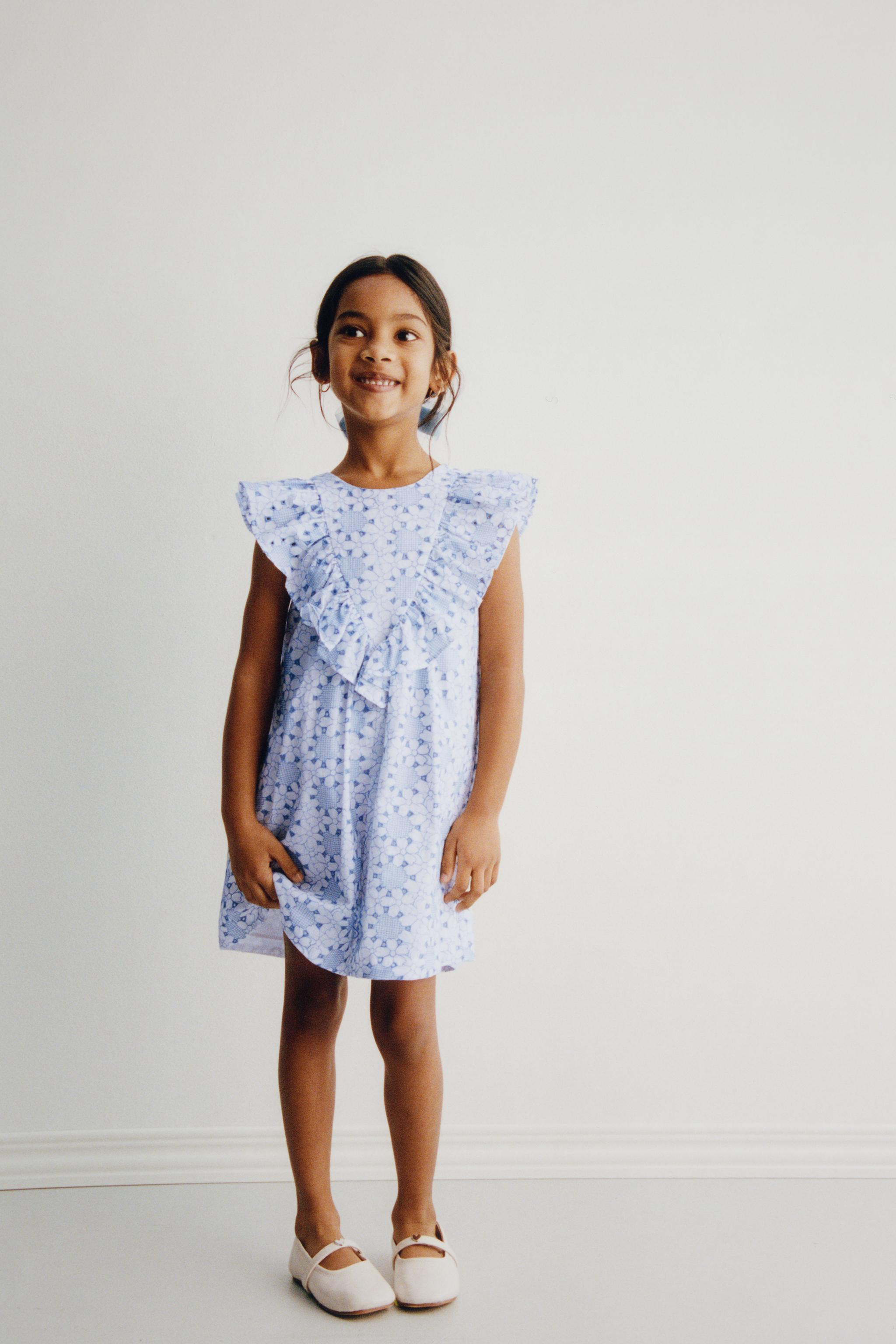 Short jumpsuit with straight neckline and straps with ruffle appliqu\u00e9. Embroidered detail. | Zara US