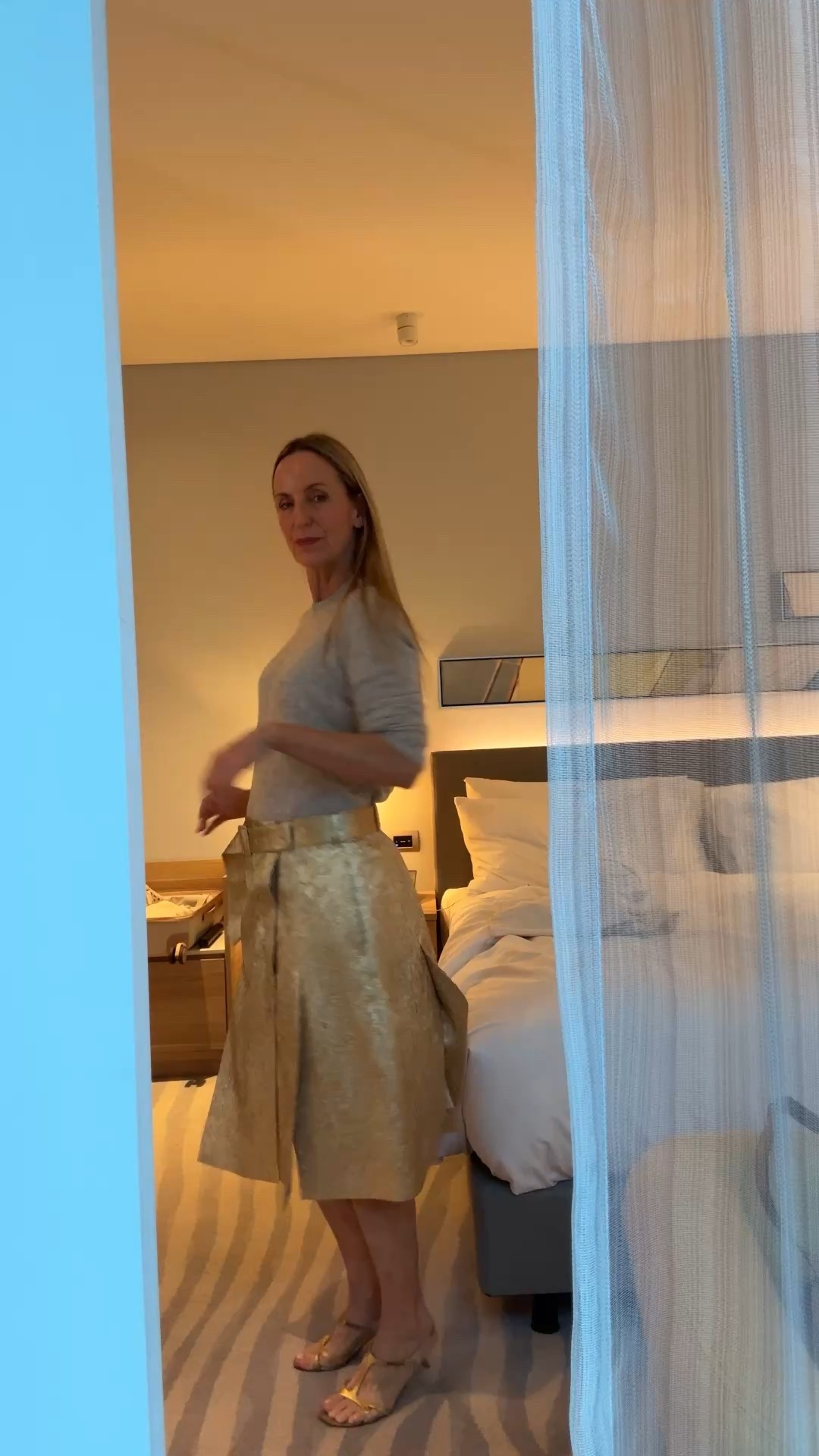 I love burnished gold in clothing and this skirt from Oroton is fabulous! Wear slightly hip slung. I’ve worn with a knit but equally you could wear with a white tee or a poplin white shirt. I’d intended to wear this with a cotton white dinner shirt I own but couldn’t find it when I was packing! I’d also love to do this for day with a sand trench over the top. These shoes I bought from Prada in 1999 and still going strong!

#LTKaustralia #LTKpartywear #LTKworkwear