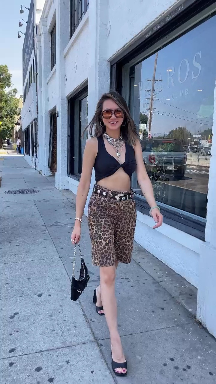 Turning up the heat in leopard print while the LA sun blazes! ☀️🐆 Leopard jorts for the win! 🏆  Hands down fav bottom purchase this summer for less than $50! I’ve changed the top to a tank, styled with mesh ballet flats and a tote bag for a more casual vibe running errands. 

Summer outfit, fall outfit, going out outfit, leopard, jorts, shorts, crop top, layered necklaces, statement jewelry, The Stylizt 

#LTKFindsUnder50 #LTKFindsUnder100 #LTKStyleTip