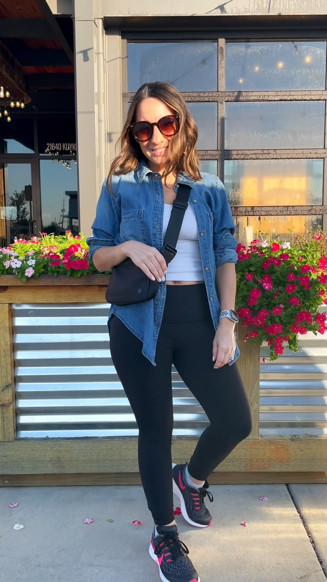 Cute, casual Athleisure wear for a day of errands while having a functional outfit. 
Chambray shirt layered with a white tank top, black leggings, sneakers, and belt bag. 
Lululemon leggings run small. Size up 1 size  
Petite style. 

#LTKmorningroutine #LTKFindsUnder100 #LTKPetite