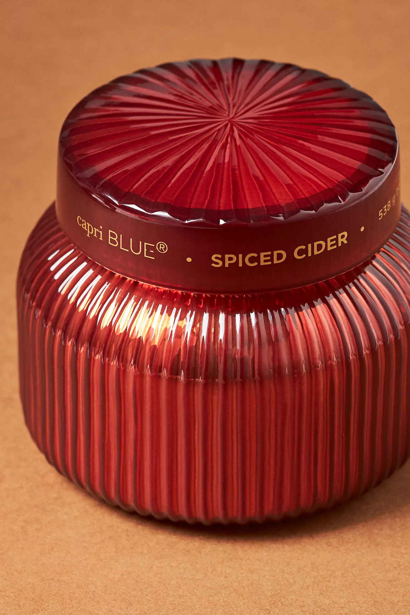 Capri Blue Spiced Cider Red Ribbed Jar Candle | Anthropologie (US)