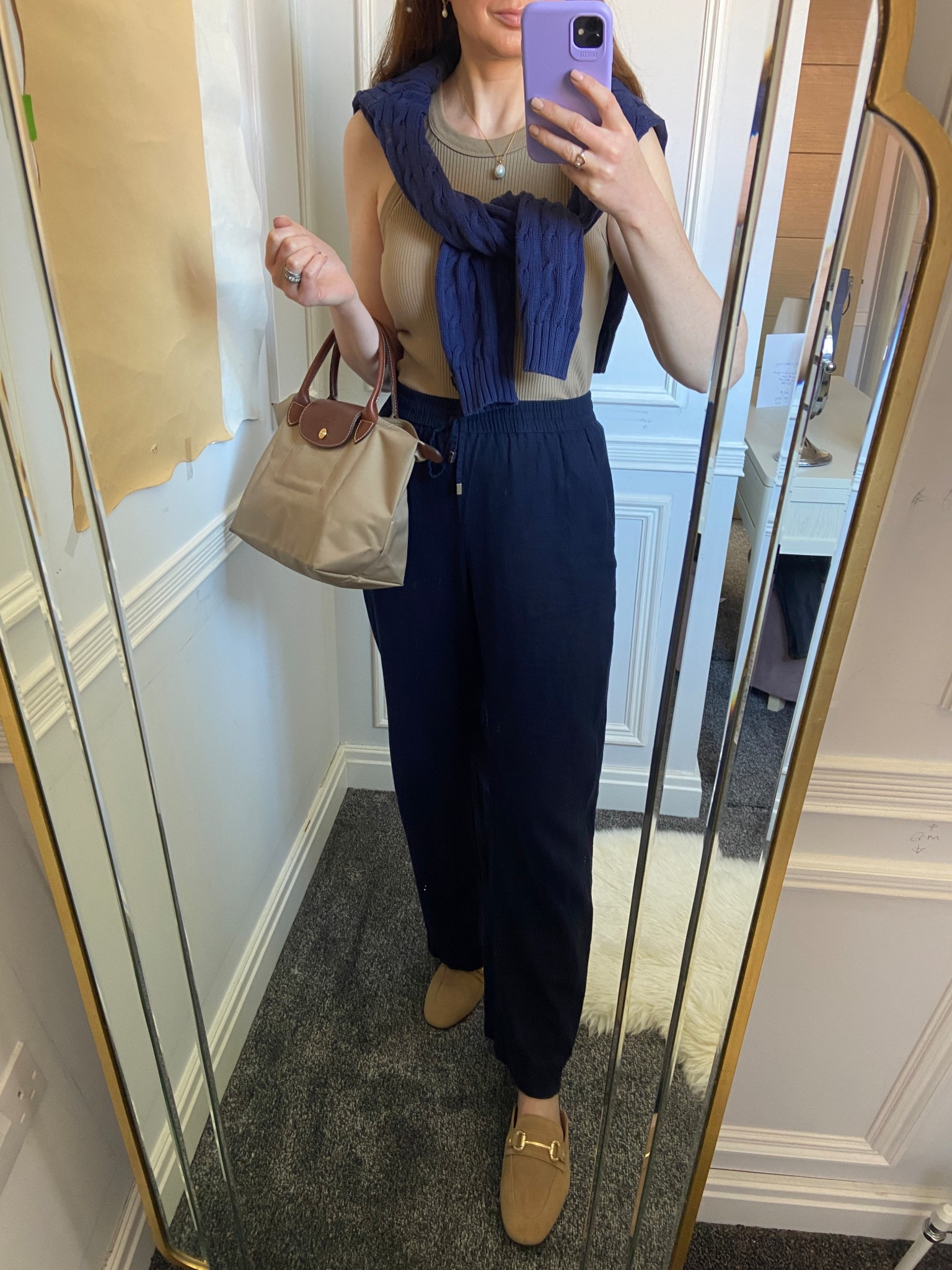 Spring neutrals done right! 💙🥐☕️Keeping it classic and effortless with my new Holland & Cooper suede loafers—so comfy & chic! Paired with lightweight navy wide leg trousers, a ribbed knit tank, and a cable knit sweater draped over the shoulders for that perfect spring layering vibe. Finished with my go-to Longchamp Le Pliage tote, because you can never go wrong with a classic! ✨ Shop my full look below! 🛍️ #SpringStyle #HollandAndCooper #NeutralOutfits #ClassicWardrobe #SmartCasualLook #EffortlessChic #PreppySpring #CapsuleCloset 

#LTKOver40 #LTKStyleTip #LTKSeasonal