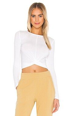 alo Cover Long Sleeve Top in White from Revolve.com | Revolve Clothing (Global)