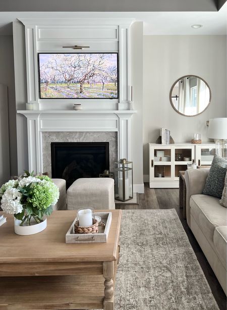 Living Room Views with my new Amber Lewis x Loloi Honora rug. 

Amber Lewis / Loloi / Rug / Honora / frame tv / Samsung / round mirror / Target decor / hearth and hand / magnolia / media cabinet / studio McGee / promontory / end table / brass / lantern / vase / hydrangeas / artificial florals / glass lamp / wall lights

#LTKhome #LTKSeasonal #LTKfindsunder100
