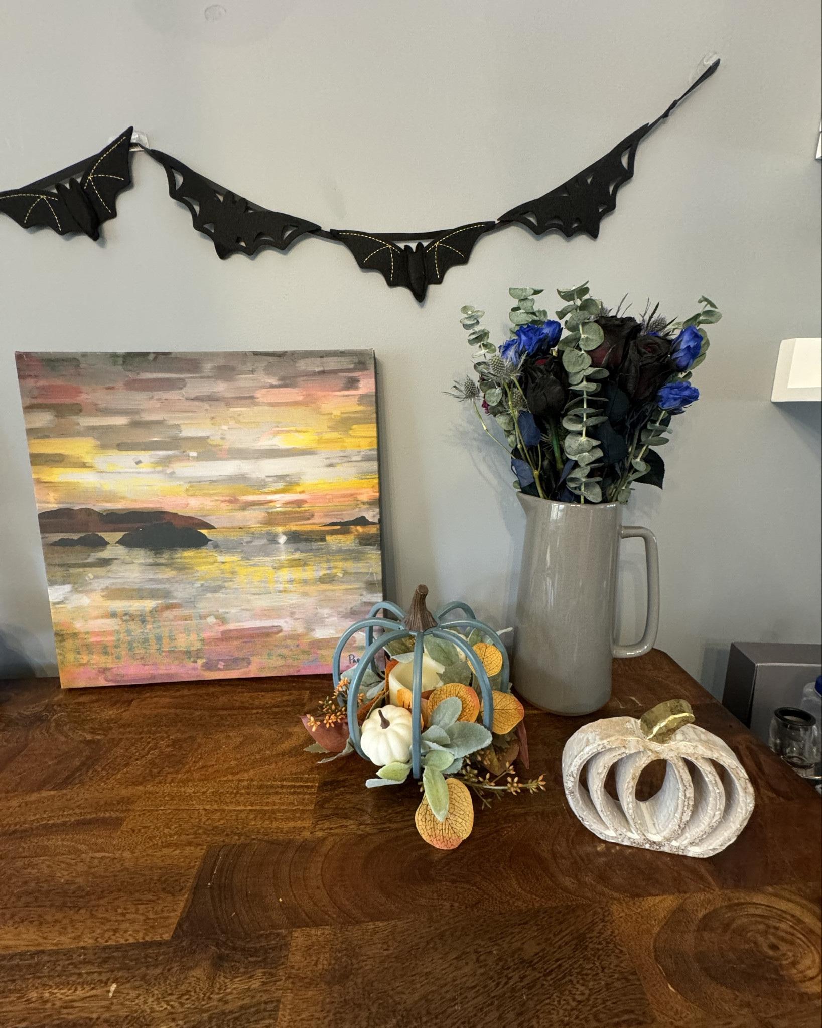 Elegant Fall Table Decor: Halloween Flowers, Pumpkins, and Black Roses 

Looking for a way to combine Halloween and Fall elements into a beautiful floral tablescape?

Here's how I made mine. I mixed high and low elements with a beautiful halloween inspired floral arrangement and some moody artwork.

Halloween Flowers can incorporate spooky yet elegant flowers like black roses and deep purple blooms.

#LTKHalloween #LTKHome #LTKHoliday