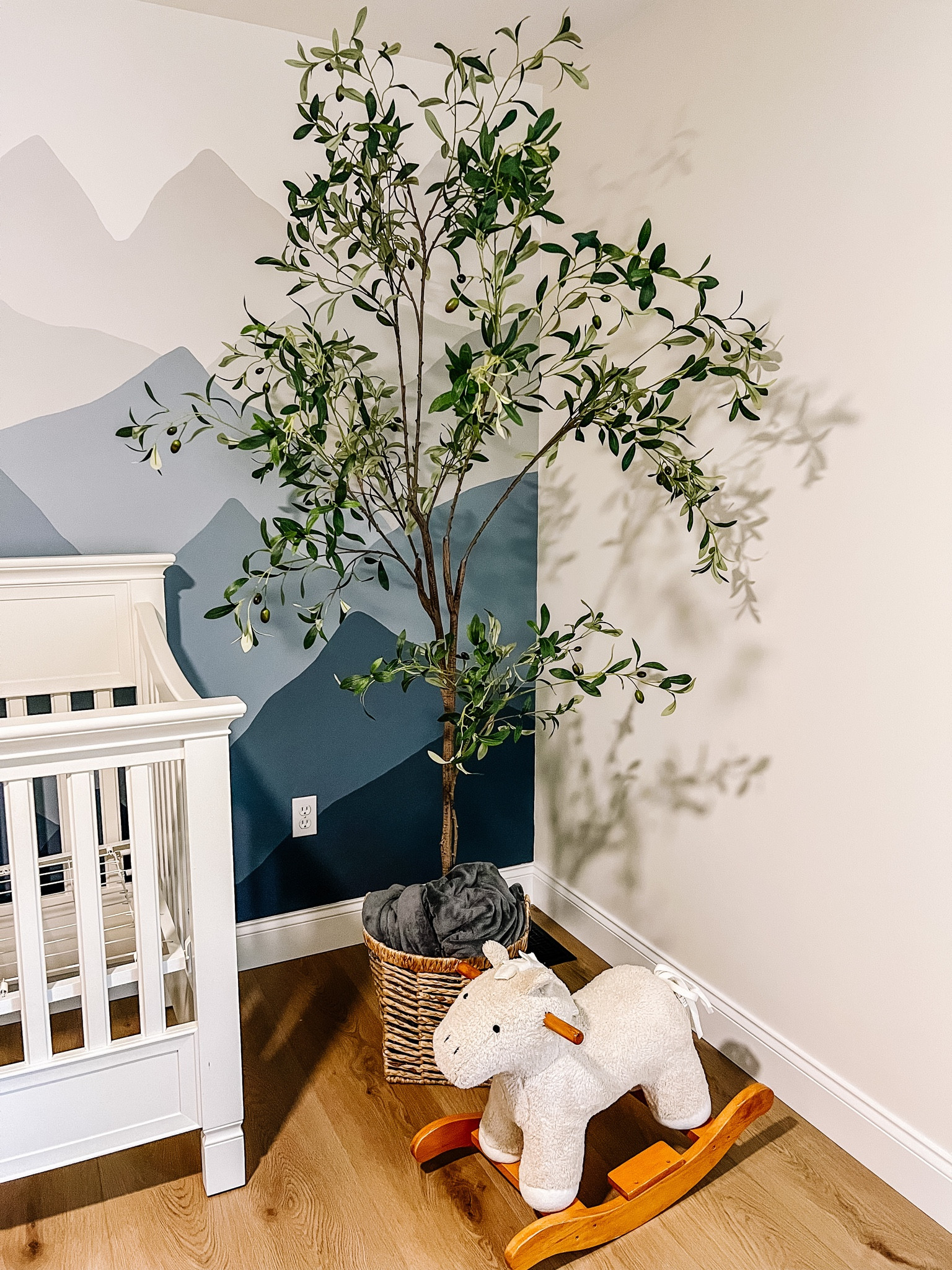 Nursery decor, olive tree, woodland nursery, faux tree, organic home decor, baby boy nursery, gender neutral nursery, pottery barn kids, rocking horse, basket, throw blanket, tree in a basket

#LTKFind #LTKhome #LTKbaby