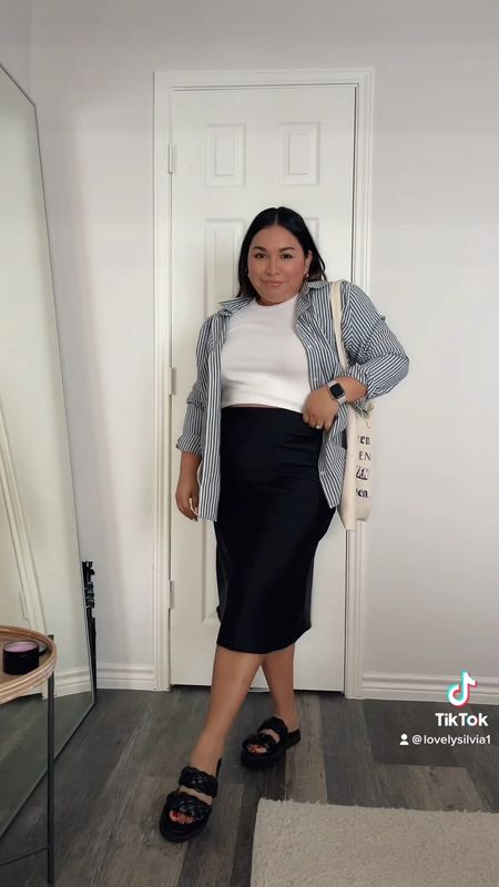 30 Days of Outfits: Day 4 features this black midi skirt worn perfectly for spring 🖤 

Black midi skirt, slip skirt, white tank top, striped button down, black braided sandals, summer outfit, spring outfit 

#LTKunder50 #LTKstyletip #LTKsalealert