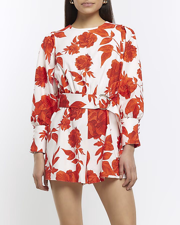 White belted floral long sleeve playsuit | River Island (UK & IE)