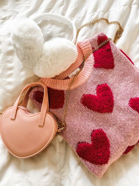 Heart purse
Earmuffs
Heart sweater
NYC fashion aesthetic
Valentine’s Day gifts 

#LTKunder100 #LTKSeasonal #LTKFind