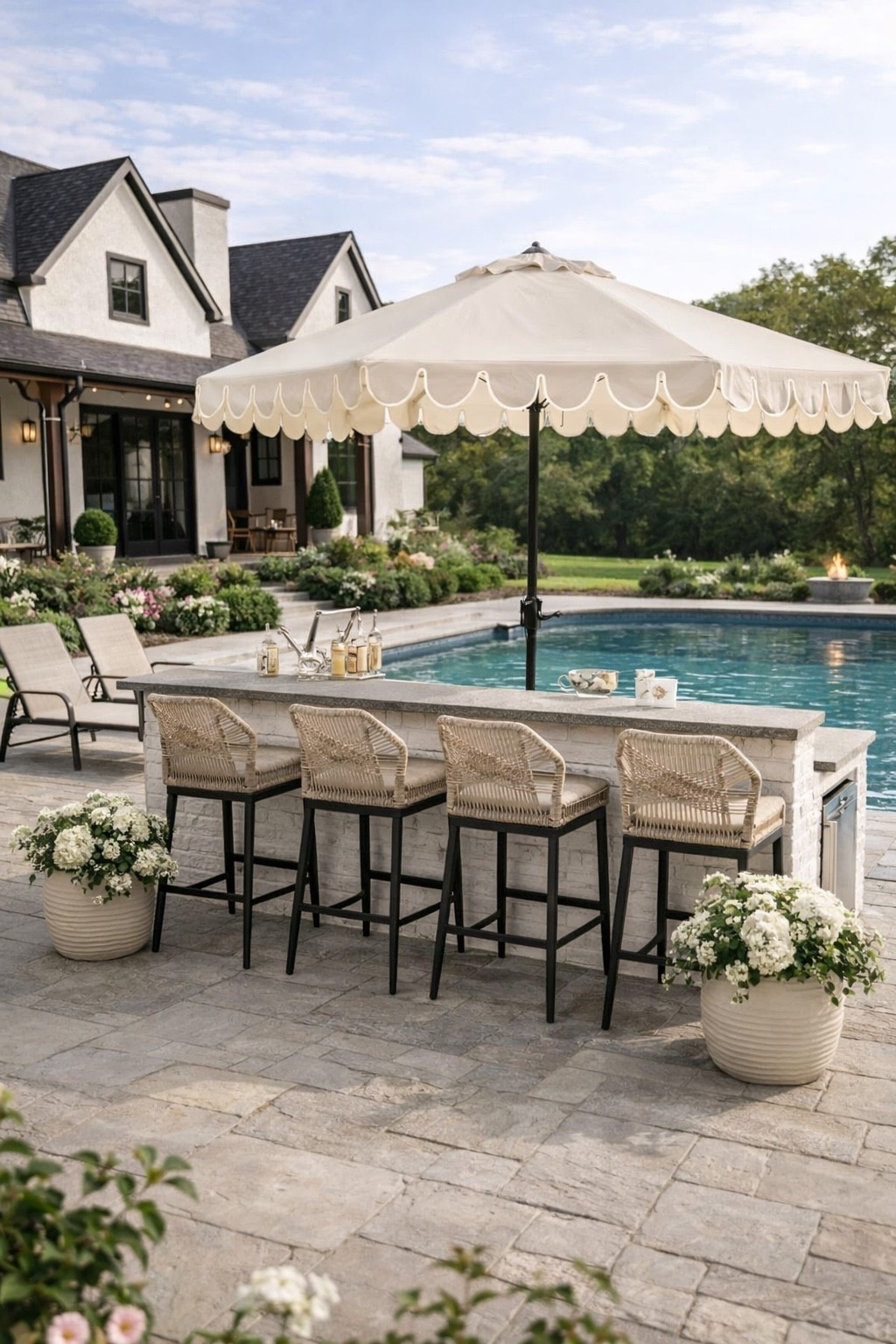 Backyard Poolside Setup with Wayfair Patio Bar & Lounge Chairs

Follow @farmtotablecreations on Instagram for more home finds 🤍

This poolside setup is what summer hosting dreams are made of. The woven bar stools add the perfect texture against the stone, and the oversized umbrella brings both shade and style. Paired with the neutral lounge chairs and planters, everything feels clean, elevated, and easy to maintain. It’s one of those spaces that instantly makes you want to sit down, pour a drink, and stay awhile.

@Wayfair #ad #wayfair #wayfairpartner #outdoorbar #patiodecor #poolside #outdoorfurniture #outdoorliving