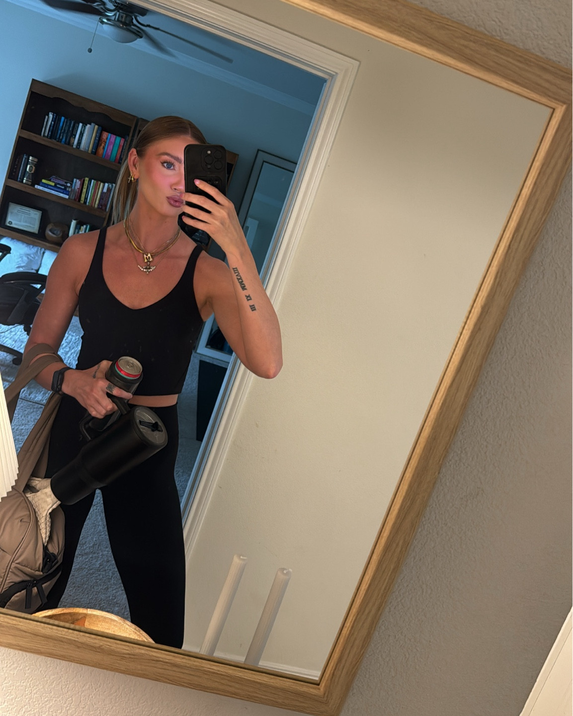 Gym ootd! If you know me, you know I always have this bag (currently 15% off for Mother’s Day), this water cup (in multiple colors), and a brumate with an Alani in it every time I go to the gym. These are nonnegotiables and necessities! And nothing makes you feel more hot than an all black outfit at the gym 😎 I’m wearing a 4 in the tank and an xs in the leggings (linking similar)! 

#LTKActive #LTKfitness #LTKtravel