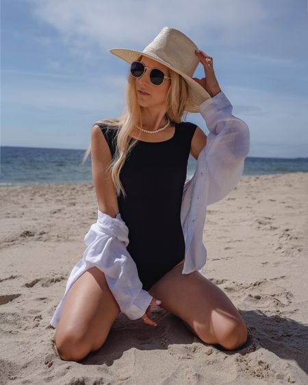Vacation outfit, beach ready, little black suit,

One piece swimsuit is full coverage and fits true to size 

Love the cap sleeves — it gives an elevated and classic look

I’ve also styled it as a body suit with jeans, linen pants, trousers, & shorts. Super versatile.
Lake life, Beach outfit, summer outfit, Classic style, vacation style, modest swimwear, elegant swim, one piece, black swimsuit, beach outfit, linens shirt, pearls, beach hat, swimwear

#LTKSwim #LTKxMadewell #LTKTravel