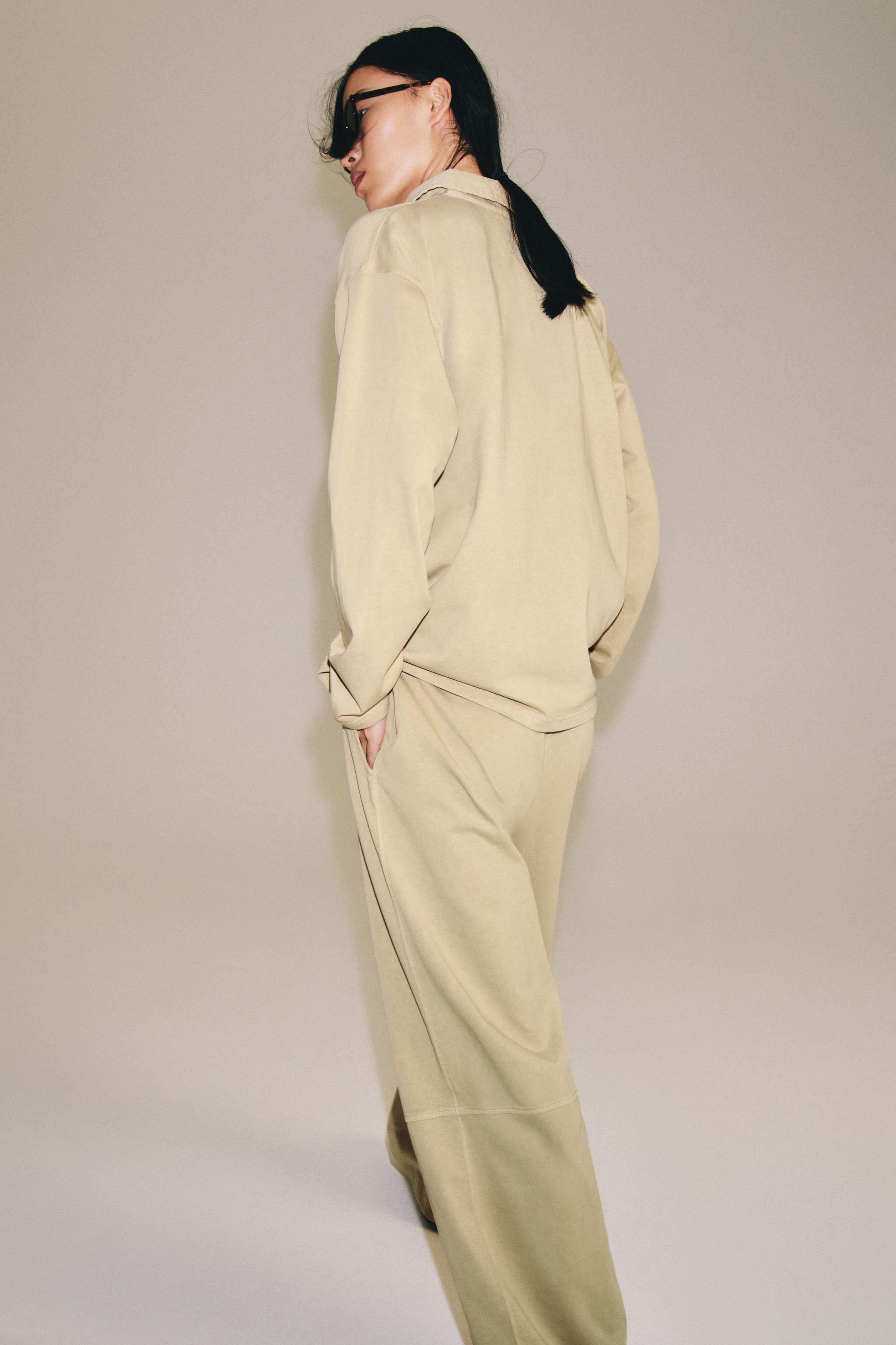 Oversize polo shirt made from 100% cotton yarn. Featuring a polo collar, long sleeves, a buttoned... | Zara UK