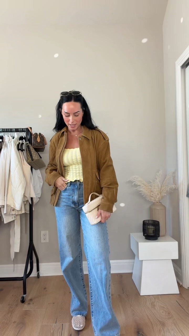 Putting together an easy spring outfit with a pop of yellow 💛 Obsessed with this Aritzia tank (yes, it’s sheer just layer it!) paired with my go-to denim + a light jacket.

Everything is on my LTK!
I’m 5’7, 145 lbs, 32DD • small tops/jacket • 27 tall jeans (everything TTS)



@Aritzia  spring outfit, spring outfit ideas, easy outfit, casual spring outfit, everyday outfit, ootd, spring style, effortless outfit, yellow tank top, Aritzia tank, sheer tank top, layering top, spring layering, denim outfit, Aritzia denim, high rise jeans, light jacket outfit, spring jacket, suede jacket, casual denim look, minimal chic, neutral outfit with color, elevated casual, clean girl outfit, cool girl style, capsule wardrobe, closet staples, simple outfit ideas, what to wear spring, how to style a tank top, how to style denim, easy everyday outfits, casual outfit ideas, spring outfits 2026

#LTKgrwm #LTKU #LTKootd
