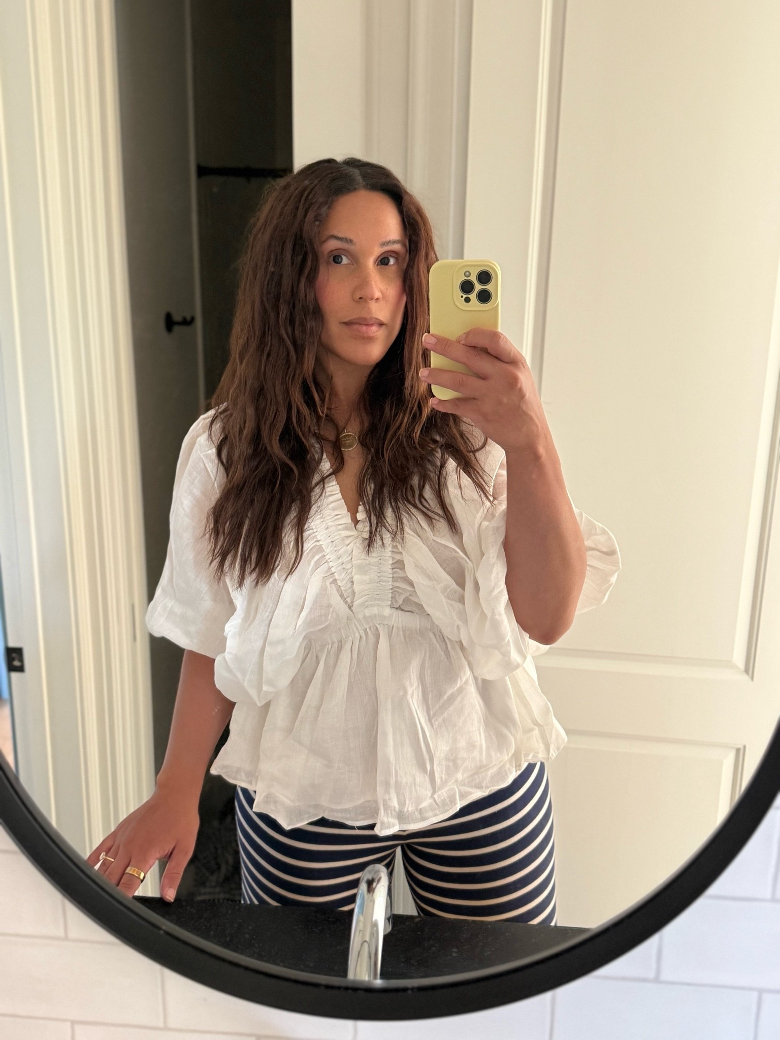 The perfect postpartum top— nursing friendly, creates a waist where there isn’t one right now and is lightweight for the hormone sweats

#LTKmomlife #LTKootd #LTKgrwm