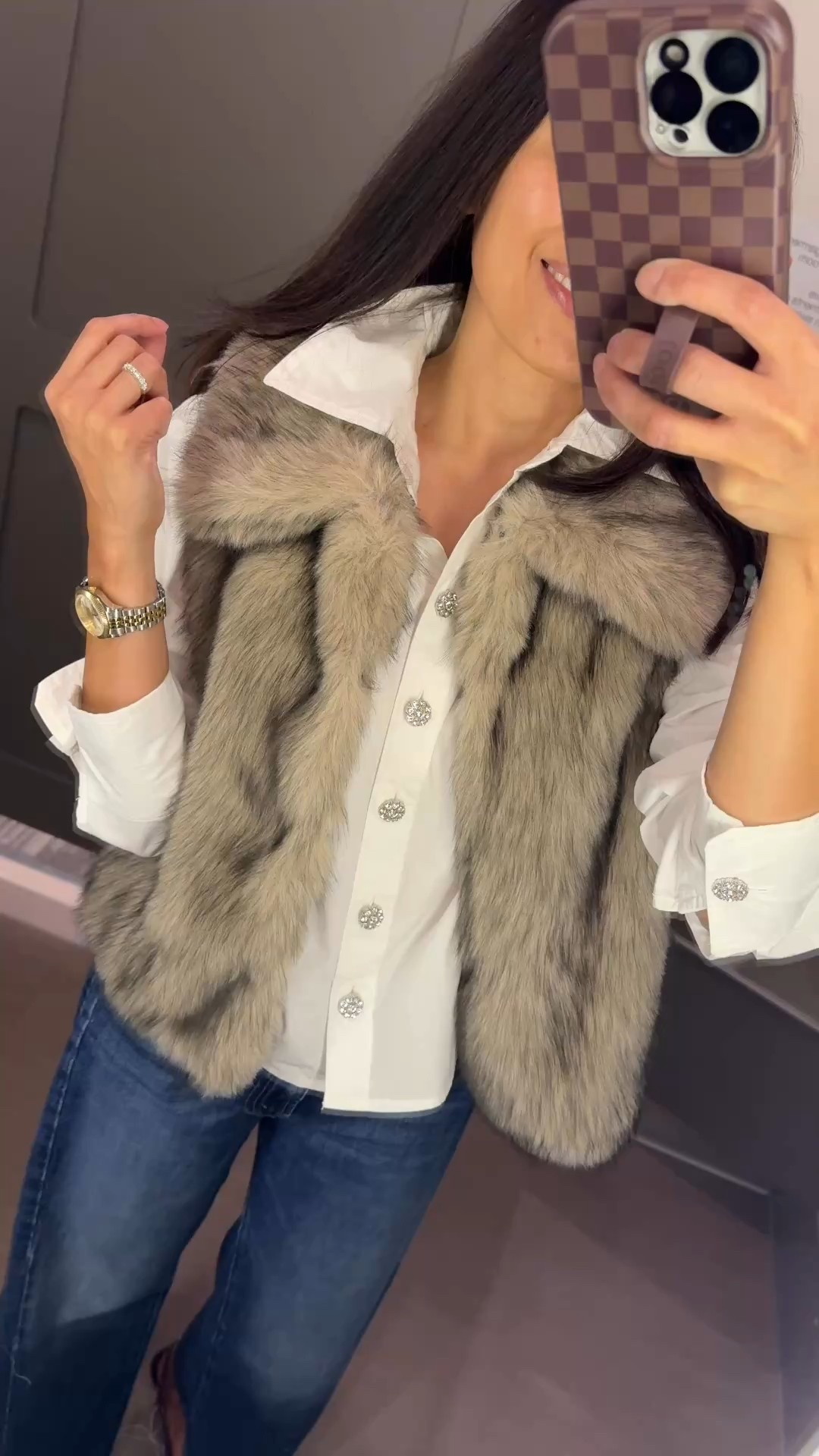 Casual holiday outfit with jeans. 
Take your favorite darker denim jeans, pair with an embellished top, add a festive textured layer. Dress up with eye-catching shoes. 
If you are shopping:
- White button down with beautiful rhinestone buttons. True to size. 
- Faux fur vest. I would need true to size. (This is a size too big.)
- Slingback heels with gorgeous rhinestone details. True to size; if in between size down. 
- Barrel jeans. 


#LTKHoliday #LTKOver40 #LTKFindsUnder50