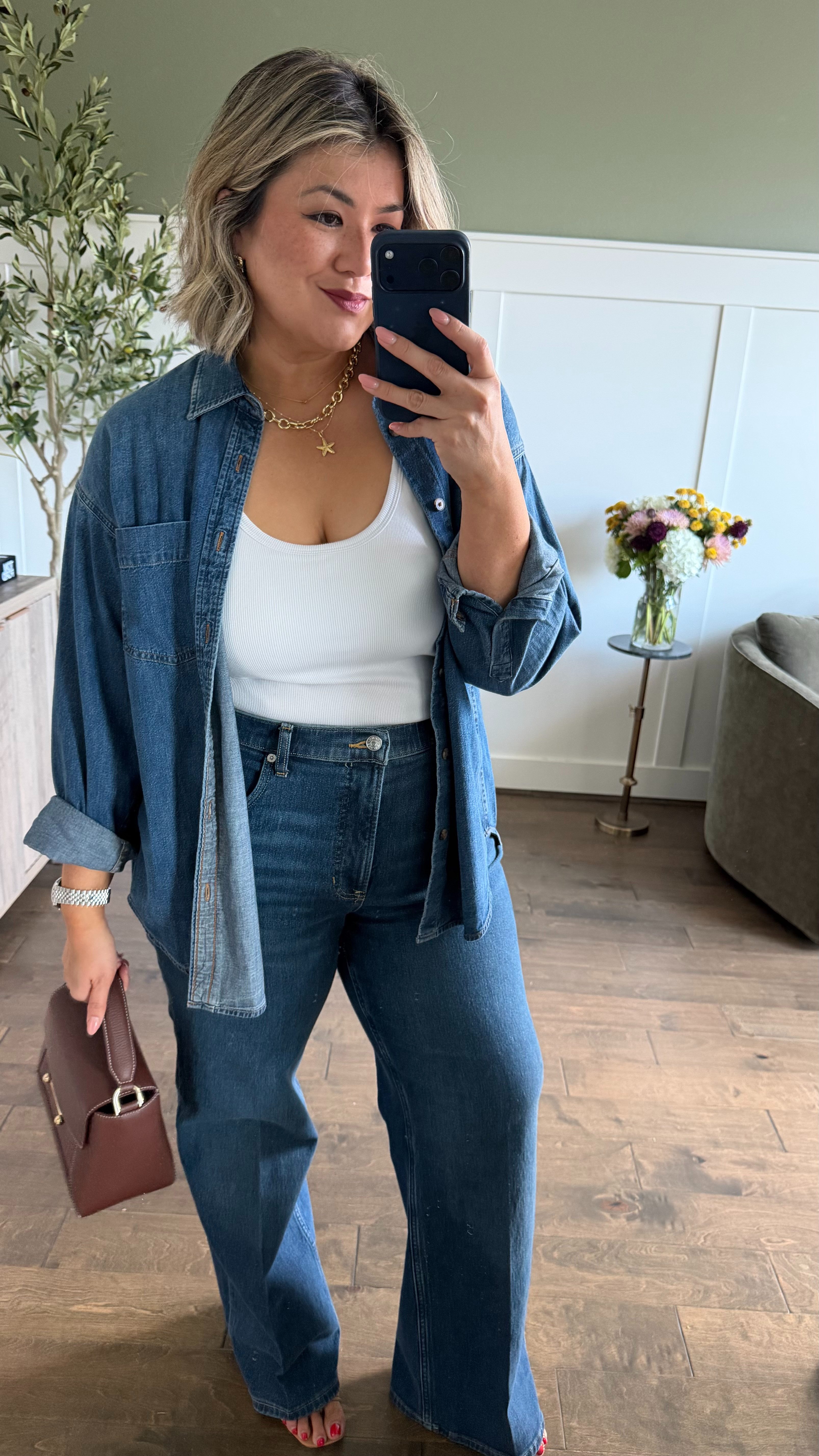 I styled these bootcut jeans with a similar shade of denim for a monochromatic look. 

I got this denim shirt last year and it became such a fall & winter staple for me. Love the oversized fit. I'm wearing a medium--I suggest sizing down one.

My typical size in all Authentic 360 jeans is an XL, petite. I initially ordered these in that exact size, however, I decided to re-order a 1X (regular inseam). While they fit a bit more loose, I much prefer comfort over the label in my pants. These jeans just happened to run a bit smaller than the others, but that’s what I’m here for—to test it out and let you know exactly how they fit so you can make the best decision for yourself when ordering! 

Use code CMCLAIREXSPANX for 15% off your first purchase + free shipping, excluding sales. ￼ 

 #LTKootd #LTKOver40 #LTKMidsize