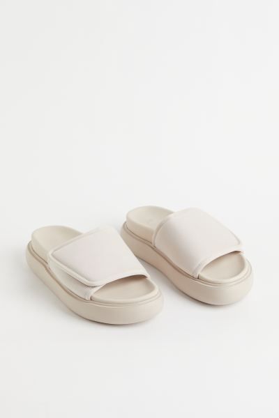 Round-toed slides in jersey with a wide foot strap that has a hook and loop fastening. Jersey lin... | H&M (UK, MY, IN, SG, PH, TW, HK)