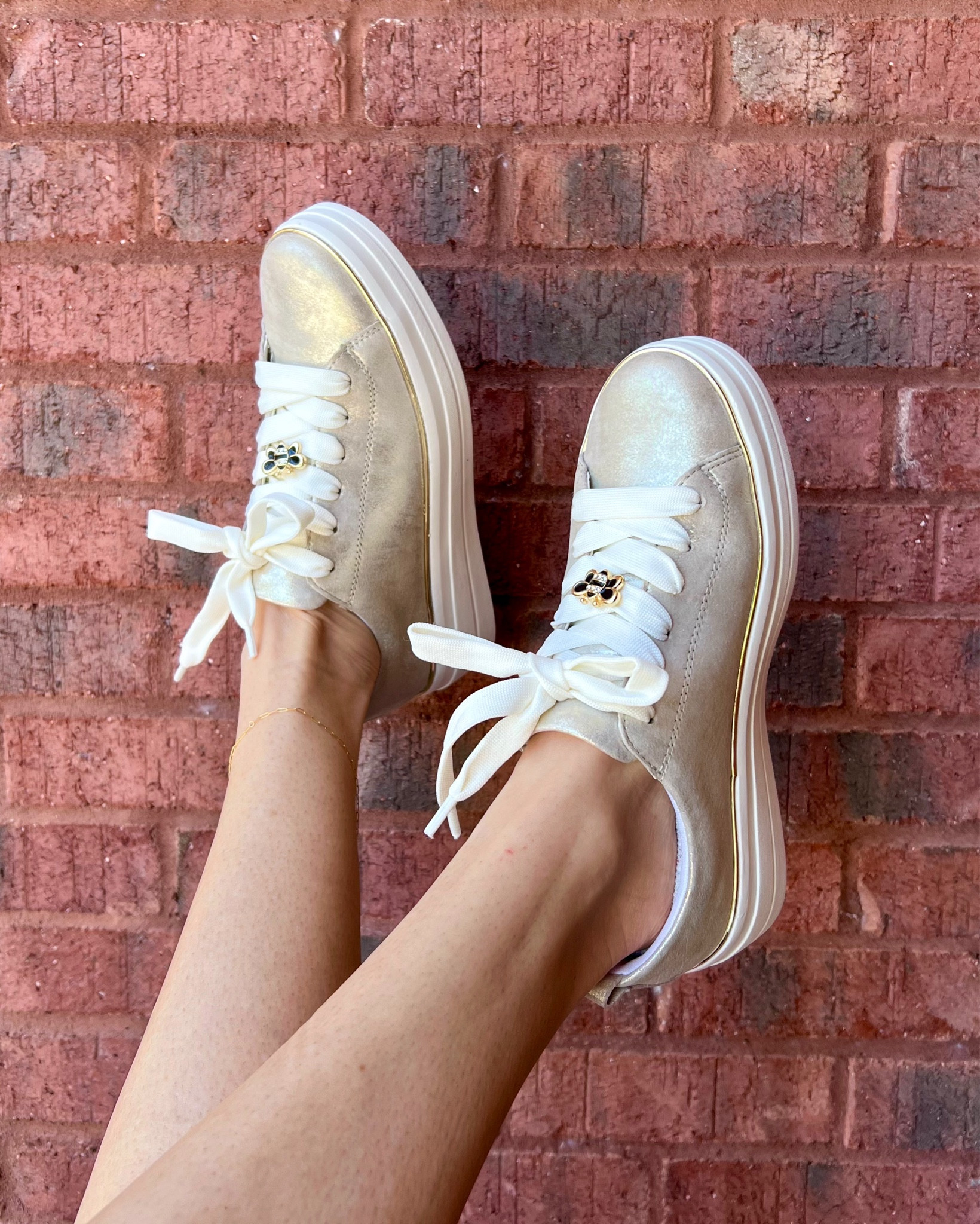 If you are looking for a stylish casual shoe that is as feminine as it is comfortable, look no further! These Remonte sneakers are SO cute! Look at the little bee charms! Adorable 🐝🐝
Click to shop! 

#LTKActive #LTKStyleTip #LTKShoeCrush
