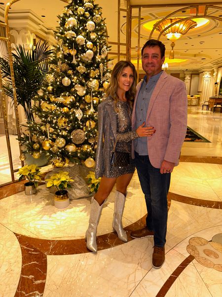 Vegas holiday outfit
New year Eve outfit idea
Sequin long sleeve mini dress from revolve
Silver wester boots
Linked similar blazer