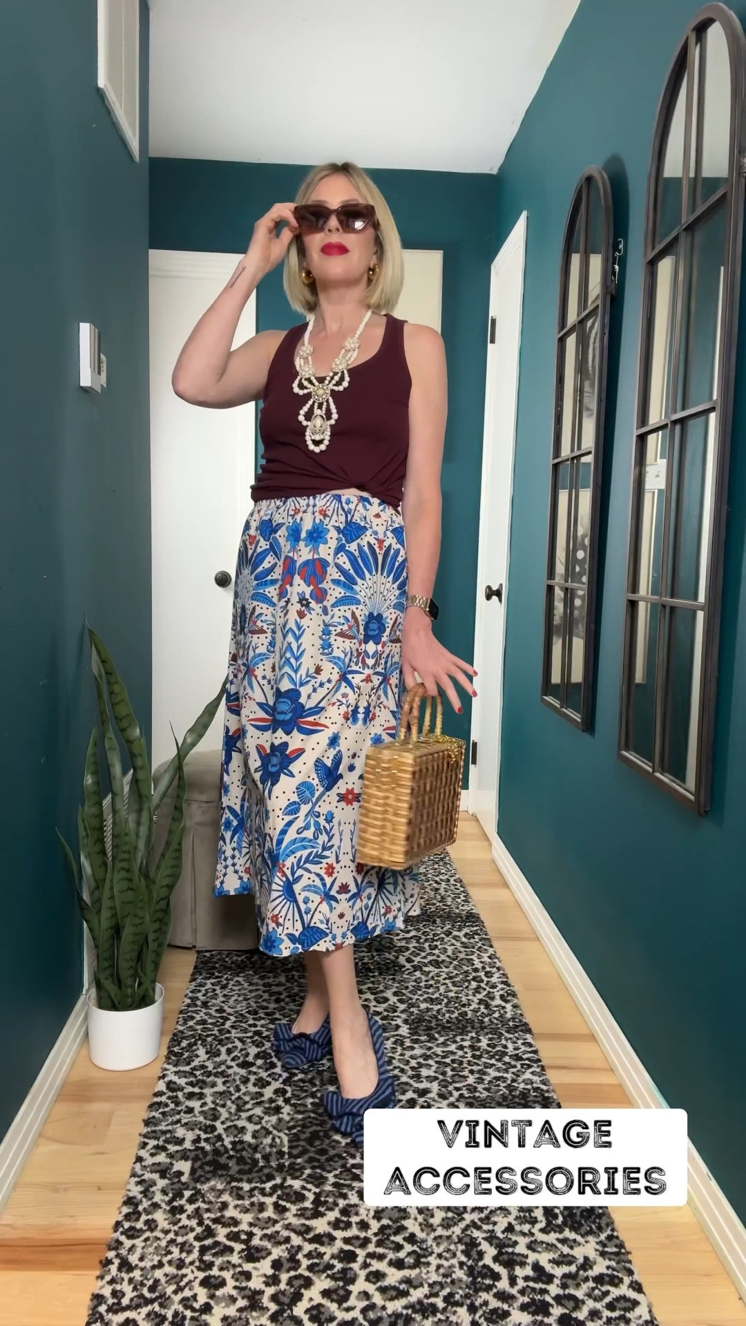 Skirt vibes, but make it vintage✨
This playful print in shades of blue is giving summer chic—paired it with a burgundy tank for contrast and topped it off with vintage accessories (always a win). But the real star? These Aerosoles ruffle pointed-toe shoes in a blue + blue stripe. Who knew they’d be this cute and this comfy? 💙👡 #SummerShoes #SummerSkirt #VintageVibes #SummerStyle #VacationOutfit

#LTKStyleTip #LTKOver40 #LTKParties