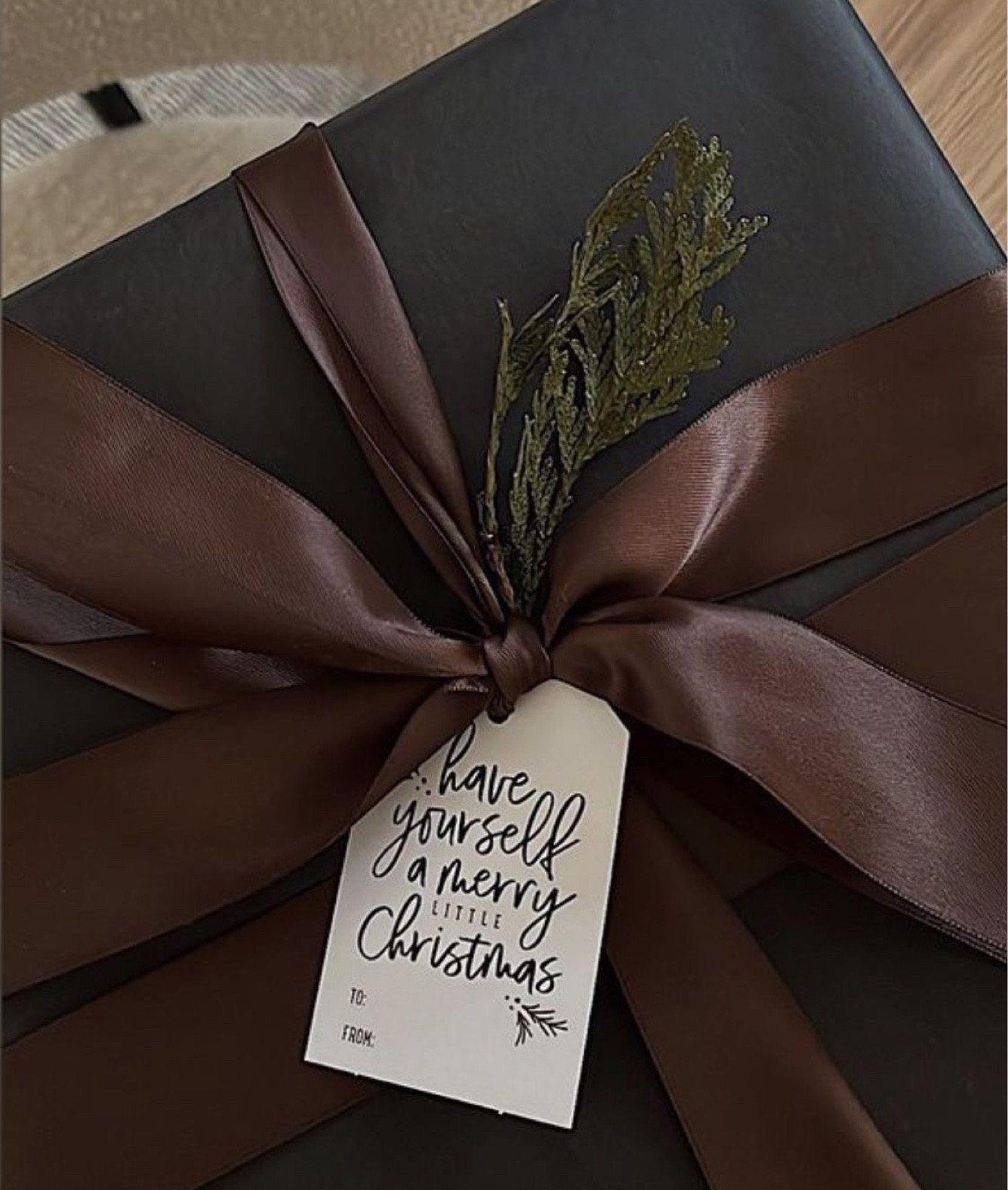 Moody holiday gift wrapping inspo 🤎🖤

#LTKHolidaySale #LTKHoliday #LTKGiftGuide