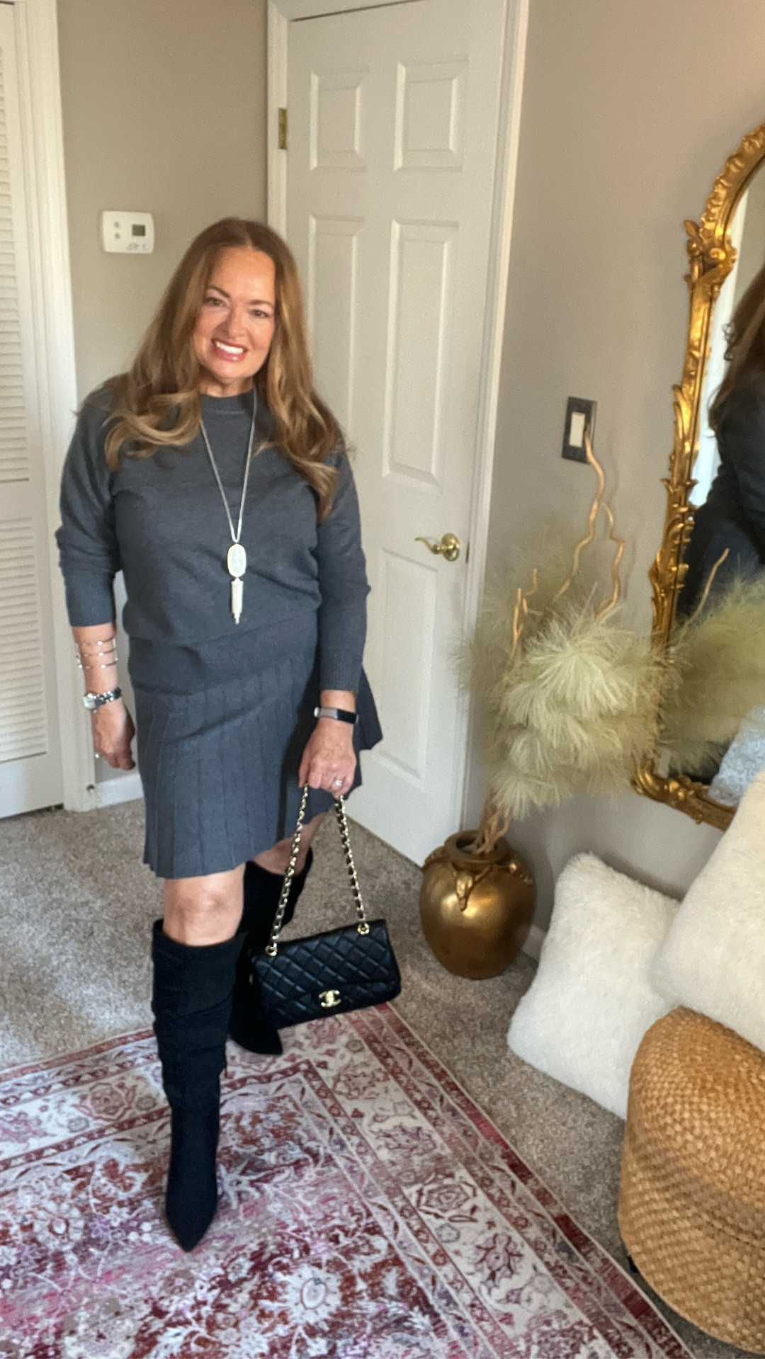 Charcoal gray 2 piece sweater skirt set! A beautiful pleated skirt and matching sweater. 

#LTKWorkwear #LTKFindsUnder50 #LTKMidsize
