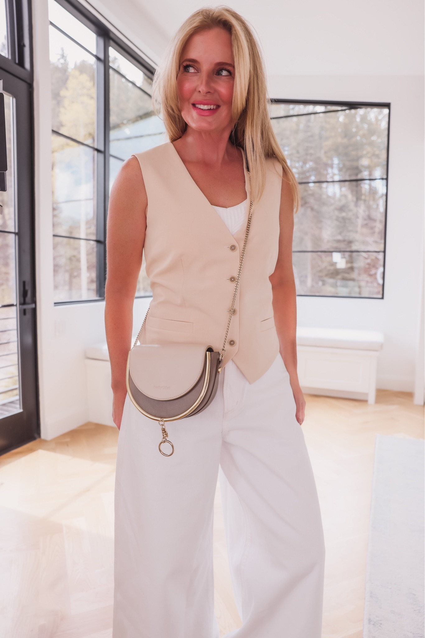 This See by Chloe bag has the most gorgeous white and gray color combination, and the gold hardware looks so luxe. This one is a little smaller so you would only be able to fit your phone, small card holder, and keys. But if you like to keep things lean, then this is a great option!

~Erin xo 

#LTKSeasonal #LTKstyletip #LTKitbag