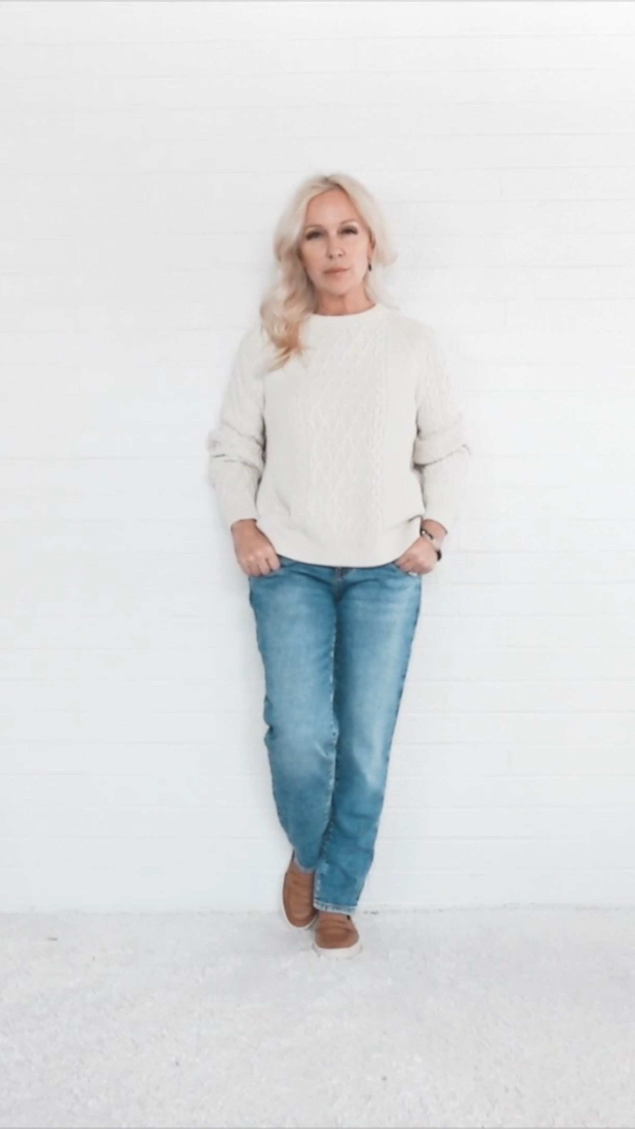 Casual boyfriend jeans outfit for midlife women. I love boyfriend jeans because they remind me of the low-slung jeans I wore in the early 1990s. Here I have paired them with a classic cable knit sweater and comfortable rubber sole loafers for a casual fall fashion look. This would be a great casual Thanksgiving outfit!

#LTKVideo #LTKShoeCrush #LTKOver40