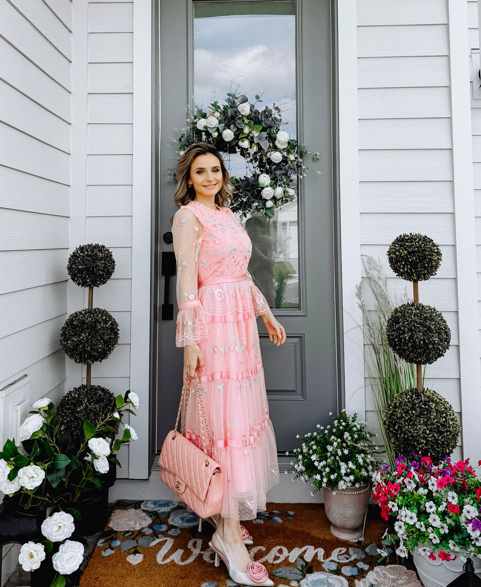 Front porch refresh 🤍✨
Linking all my porch decor — most of it is from Walmart & Amazon (so affordable + easy to style!). My topiary trees are similar faux boxwood styles that give that clean, designer look without maintenance 

My white rose wreath is from Wayfair and comes in different colors — it’s such a statement piece for the door 🤍

Wearing a similar dress from the same brand — amazing quality, feminine, and perfect for spring/summer 💕

#LTKmomlife #LTKHome #LTKMothersDay