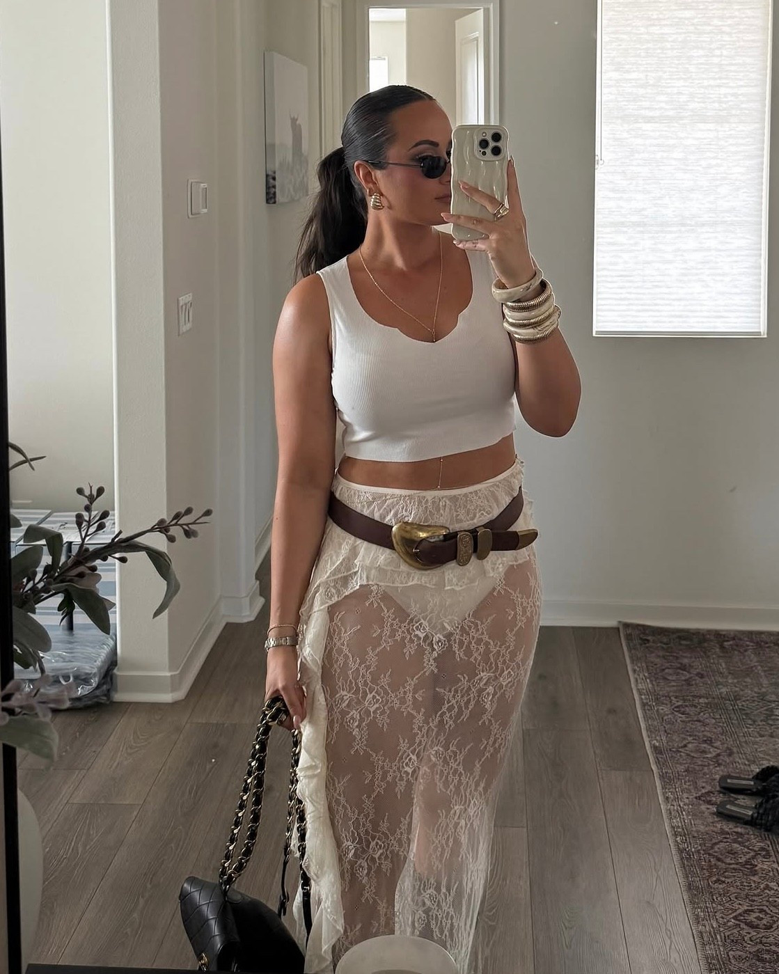 Sheer lace maxi skirt outfit for festival season styled with black boots and a comfy white tank 

#LTKootd #LTKSeasonal #LTKFestival