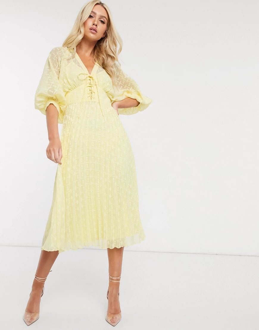 ASOS DESIGN pleated dobby midi dress with lace up front in yellow | ASOS (Global)