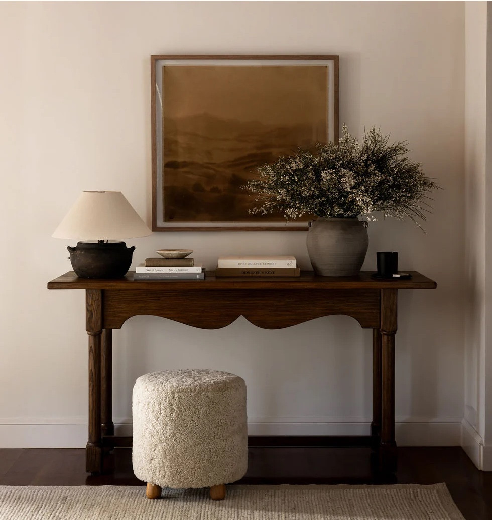 Beautiful and functional, hand-carved detailing and a unique aged finish make the Lette Console a forever heirloom. Its stylish apron detail adds a touch of elegance, while two side drawers offer convenient storage. Antique-inspired, this console is endlessly versatile with a design that will compliment any aesthetic.



#LTKHome