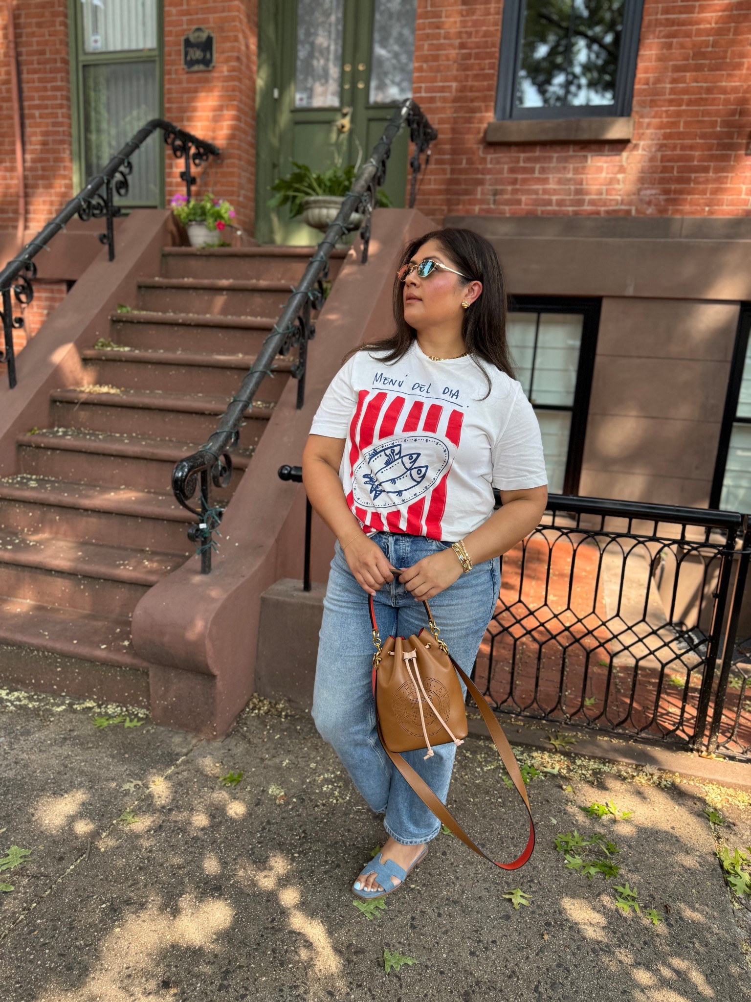My exact tee is sold out but you can purchase the similar one I linked it’s under $18!

#LTKOver40 #LTKMidsize