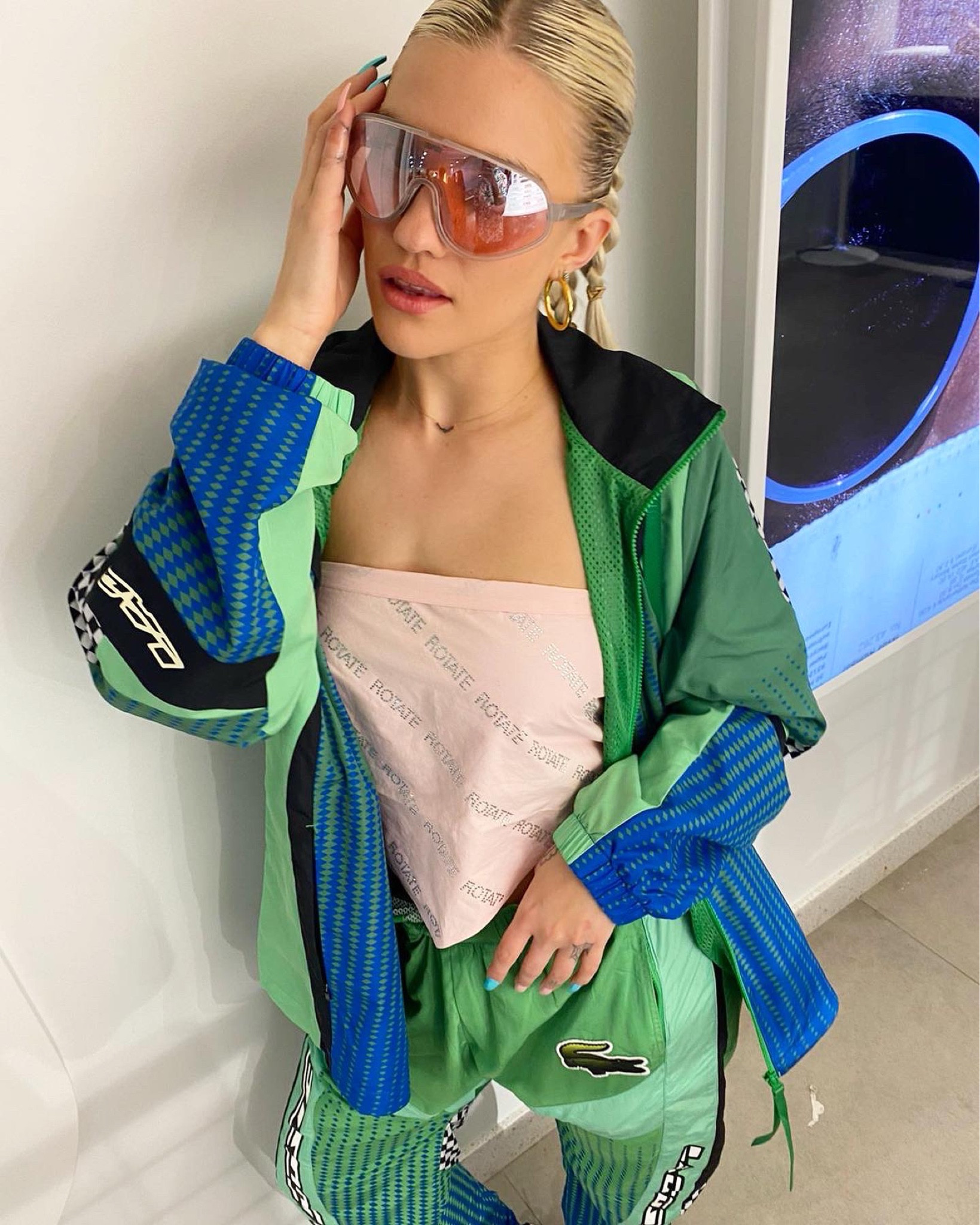 Lacoste 🐊 tracksuit, graphic-print, blue tracksuit, green tracksuit, nylon, bandana top, crop top, silk scarf top, rhinestone pink top, oversized sunglasses, pink visor sunglasses, gold hoop earrings, spring outfit ideas, farfetch, Street style 

#LTKSeasonal #LTKeurope #LTKfit