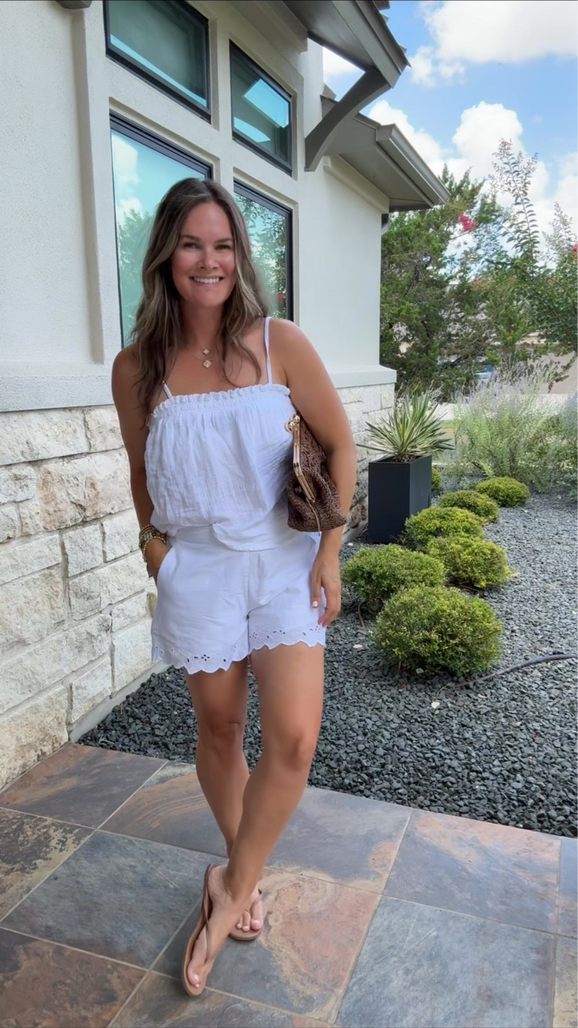 An all-white summer outfit you’ll wear over and over. These shorts have been such a good Target find!

#LTKootd #LTKSeasonal #LTKTravel