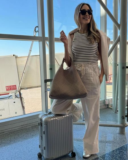 Airport travel outfit idea for a warmer destination 
Everything runs tts. Wearing a size small 

#LTKstyletip #LTKitbag #LTKtravel