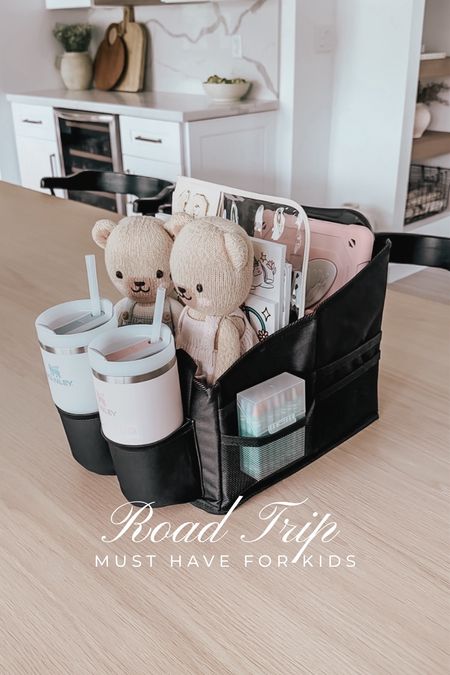 Road trip must have for kids 🤍 this backseat center console organizer holds all the kids essentials for a road trip. It has space for iPads, games, water bottles, snacks, wipes + more 🛣️

#roadtrip #roadtriphack #kidsroadtrip #travelwithkids #roadtripwithkids #amazon #amazonfinds #travelfinds #car #carfinds #carorganization #carorganizer #kidswaterbottle #cuddleandkind #summer #snacks 

#LTKTravel #LTKFamily #LTKFindsUnder50