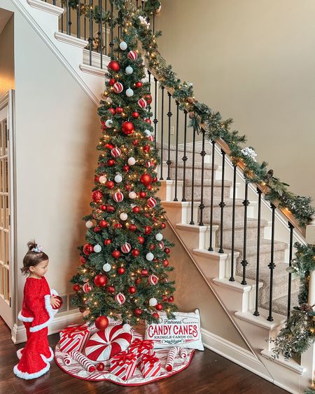 Candy cane Christmas corner! Used a 9ft skinny tree for this entry way set up leading up our staircase. 

Christmas tree. Candy cane decor. Christmas decor. Christmas 2023. Candy canes. Peppermint pillow. Christmas decorating. Themed Christmas tree. 

#LTKSeasonal #LTKhome