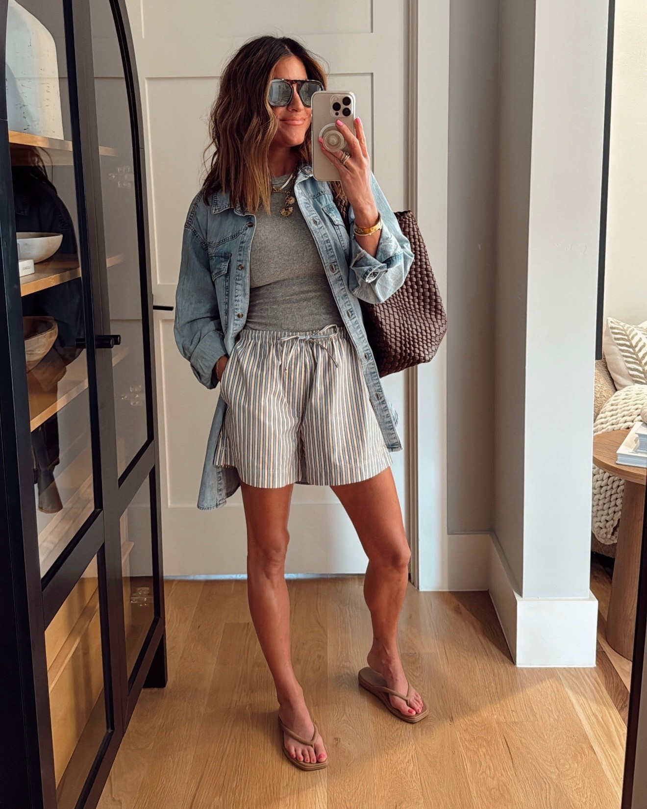 Easy summer outfit that I’ll definitely be wearing on repeat! My shorts are on sale for $20 today 👏🏼🙌🏼 
Wearing an xs in the shorts and tank, and a small in the denim top. 

#LTKFindsUnder50 #LTKSaleAlert #LTKStyleTip