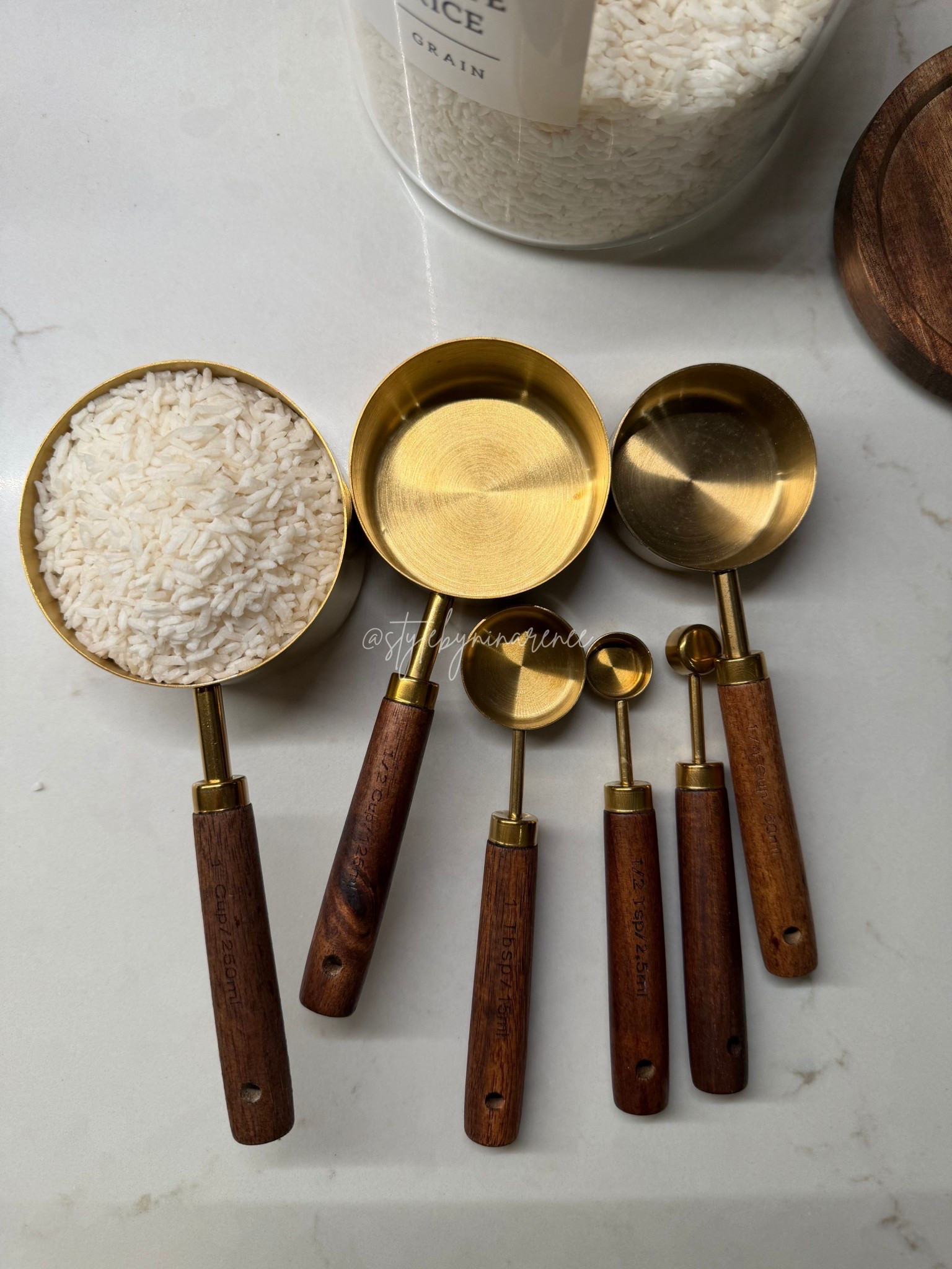 These measuring cups and spoons are both functional and beautiful, which makes them perfect for everyday use and countertop storage. The brass finish paired with the wood handles gives them a clean, elevated look that works in modern or neutral kitchens.

Each piece feels sturdy and well-made, with clearly marked measurements that make cooking and baking easier. I love that they double as decor when left out, instead of needing to be hidden in a drawer.

Linked here for easy shopping.


#LTKHome