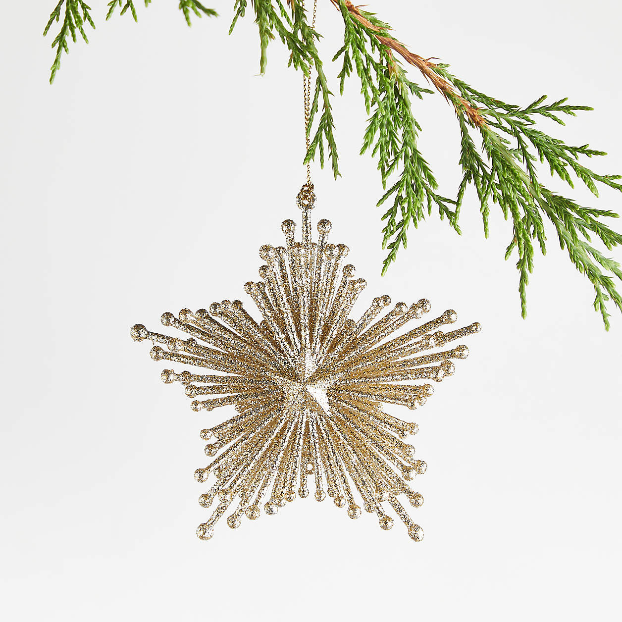 Gold Glitter Starburst Christmas Tree Ornament + Reviews | Crate & Barrel | Crate & Barrel