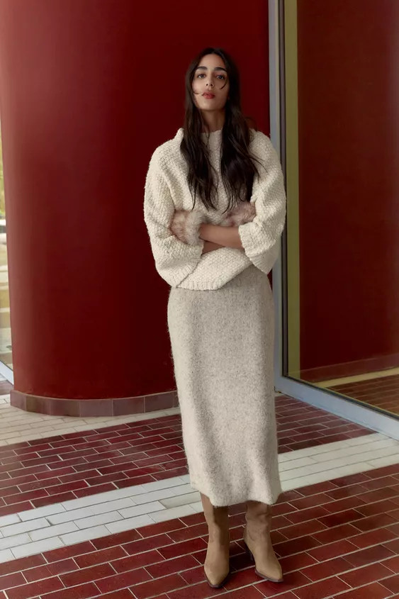 Round neck jumper with wide cape-style sleeves. | Zara US