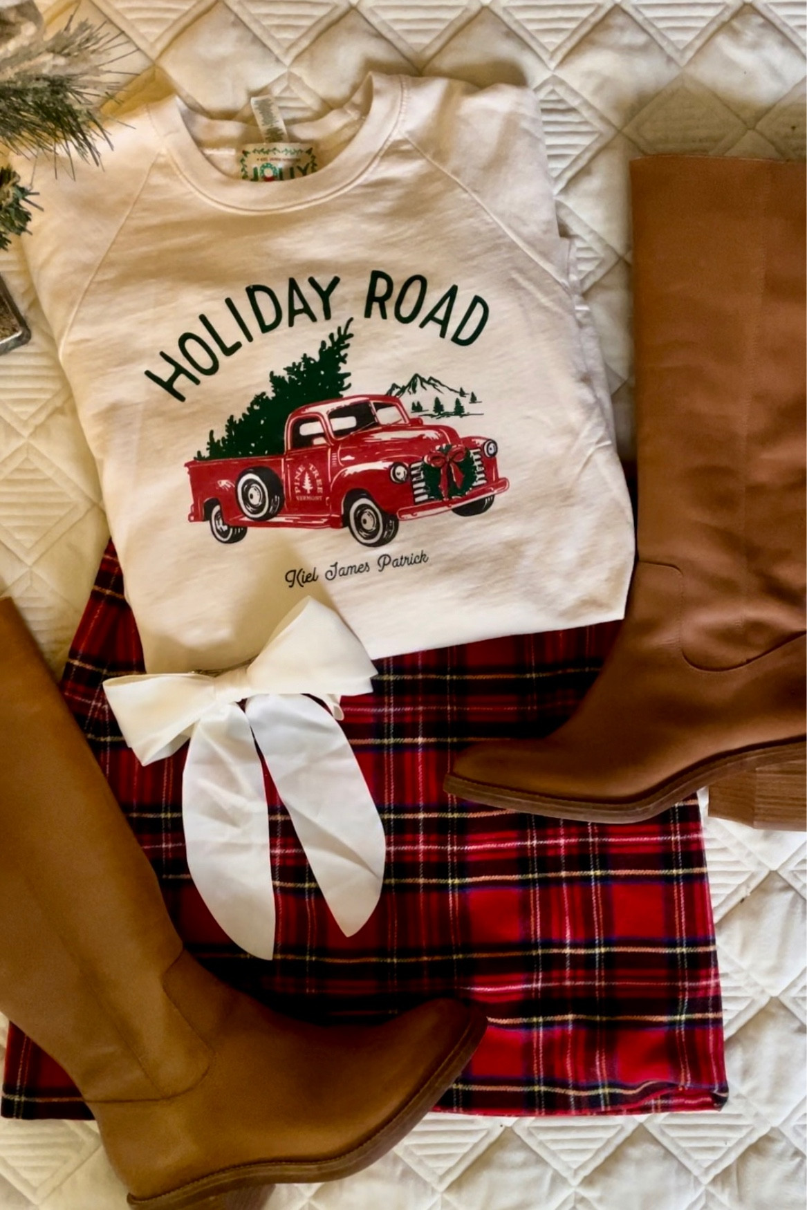 Elevated casual holiday look 🌲 I own an almost-embarrassing amount of KJP sweaters and sweatshirts but I love them so much ❤️ I wear these boots almost every day — they are a staple. All pieces fit TTs 

Christmas tree, truck, hair bow, tall boots, plaid skirt 

#LTKshoecrush #LTKSeasonal #LTKHoliday