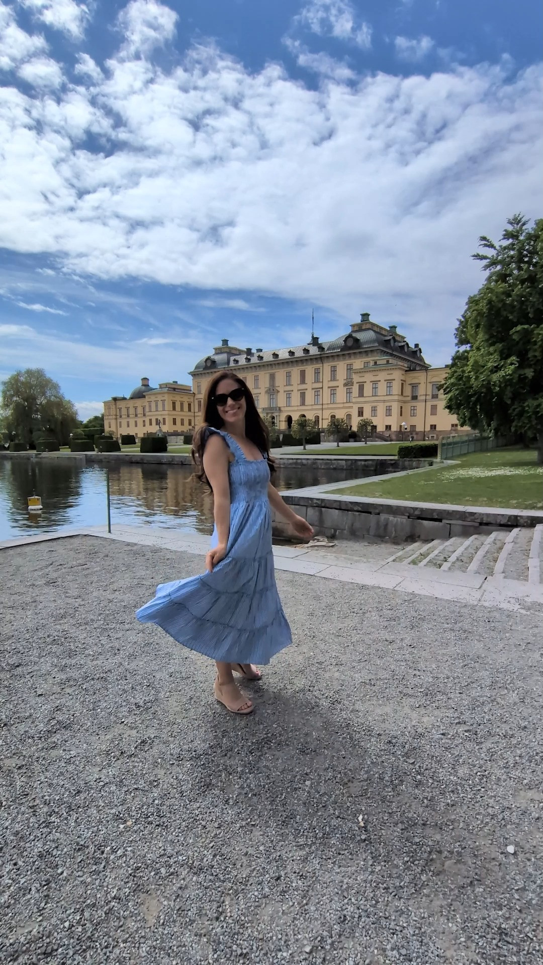 The travel dress that took me all over Stockholm from royal palaces to charming cafes. This @quince style is a great cut for petites! I'm 4'11 and wearing the XS. Love the femininity of the ruffled shoulder, tiered skirt, and smocked bodice. Pairs well with wedges or your trusty travel sneakers. Comes in multiple colorways. I'm linking all of my favs. 

summer outfits over 40 | summer dress | travel dress  

 #LTKOver40 #LTKPetite #LTKTravel